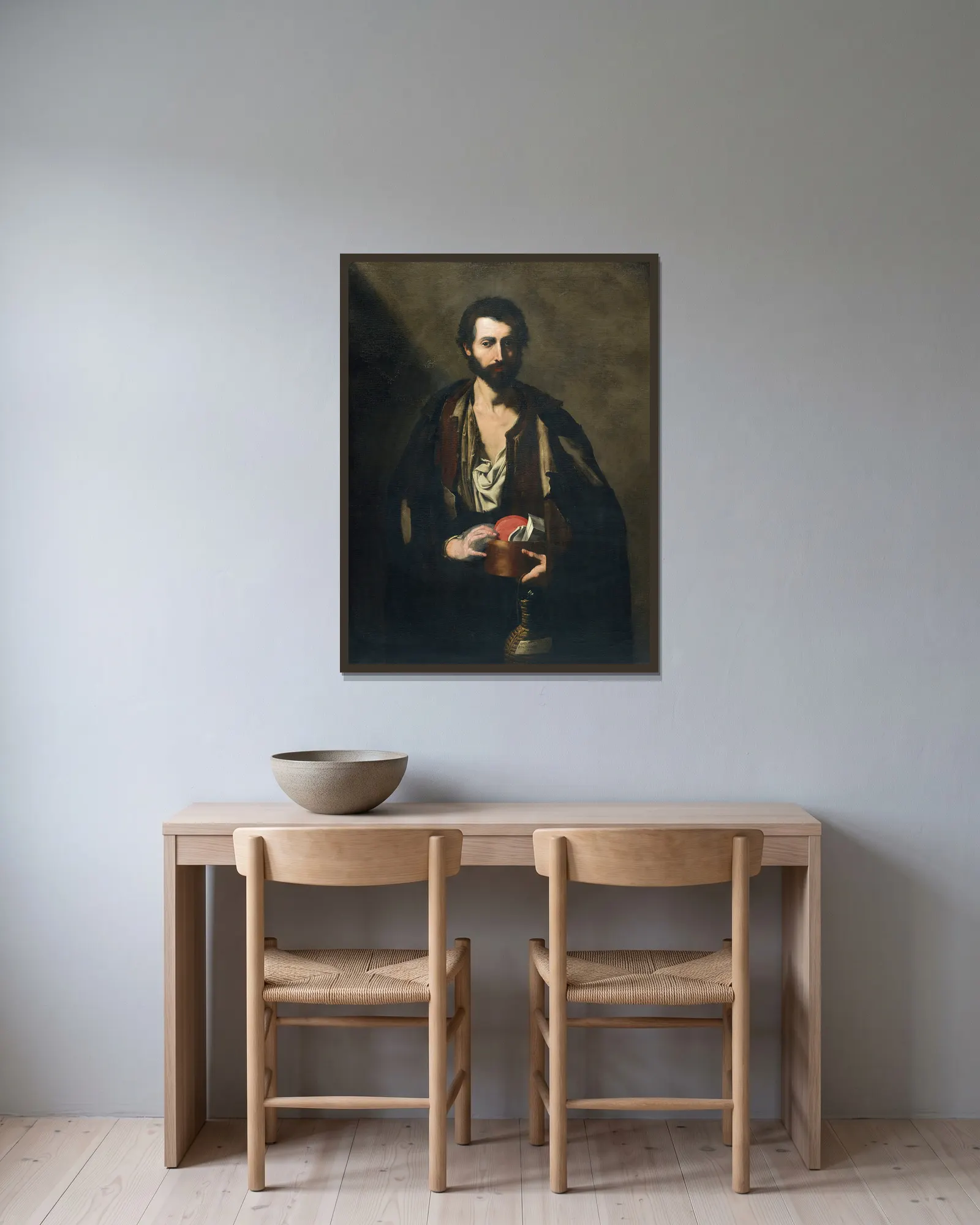 A philosopher with a wine flask av Jusepe de Ribera inramad på en vägg