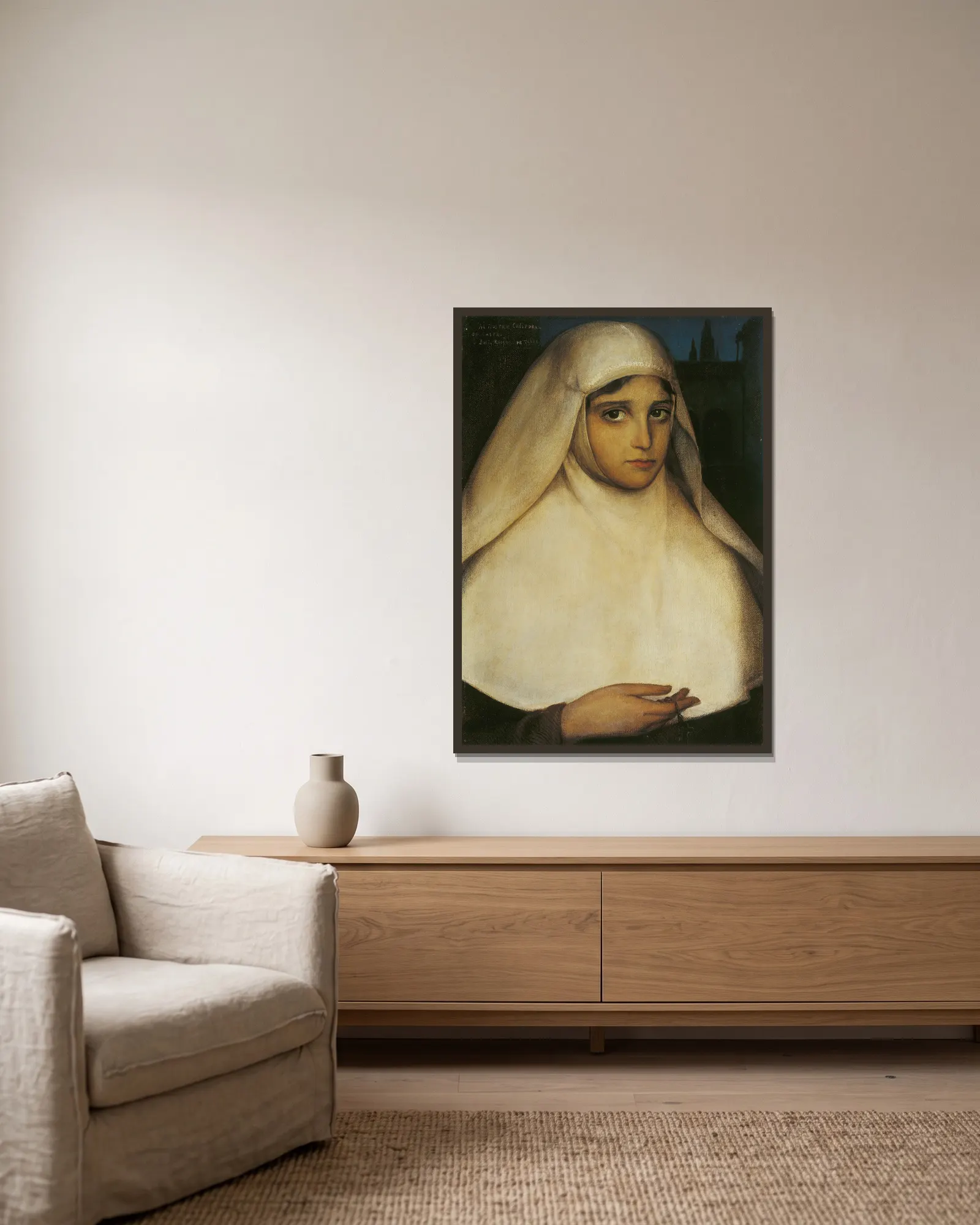 Nun av Julio Romero De Torres inramad på en vägg