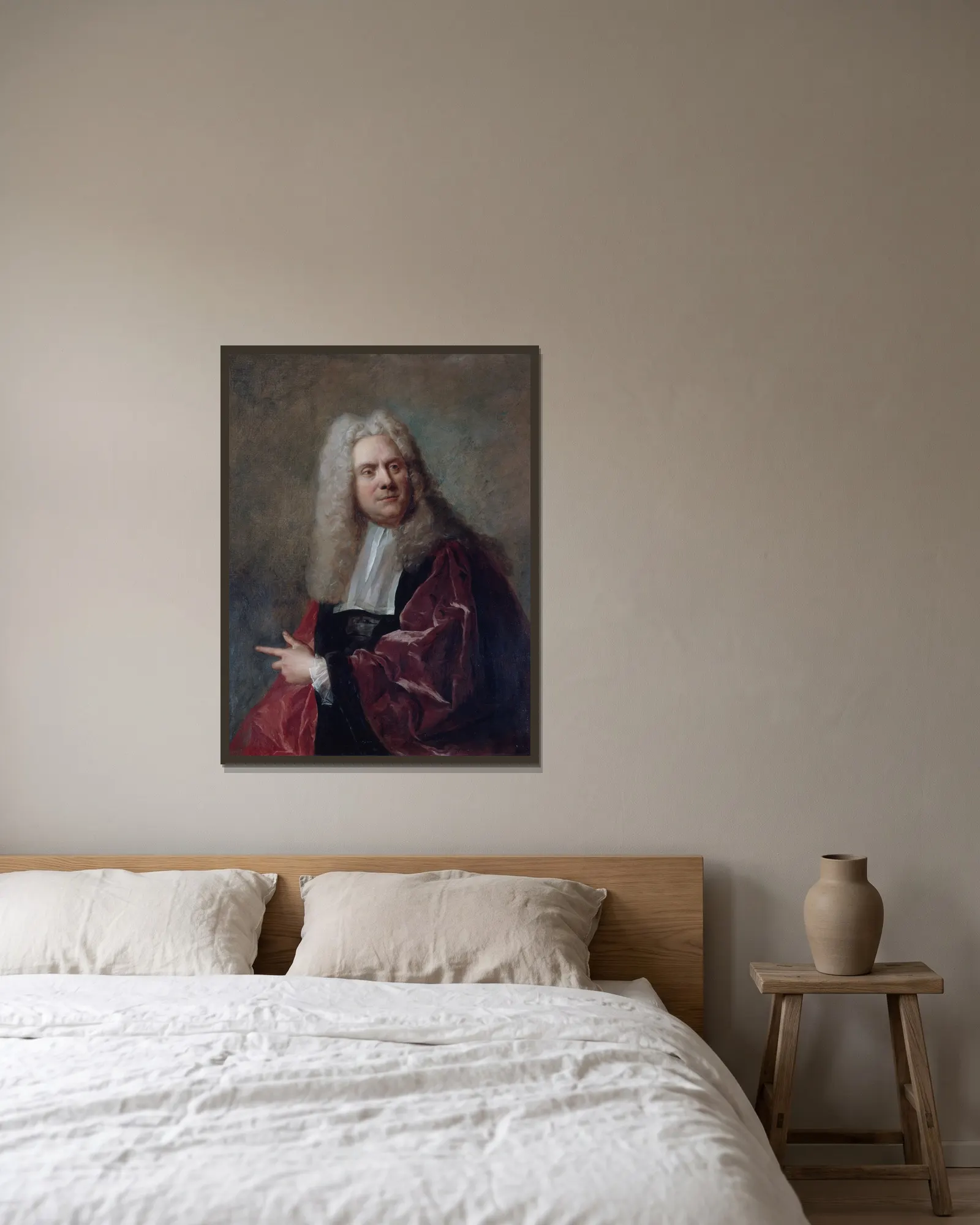 Portrait d’un échevin av Jean-François de Troy inramad på en vägg