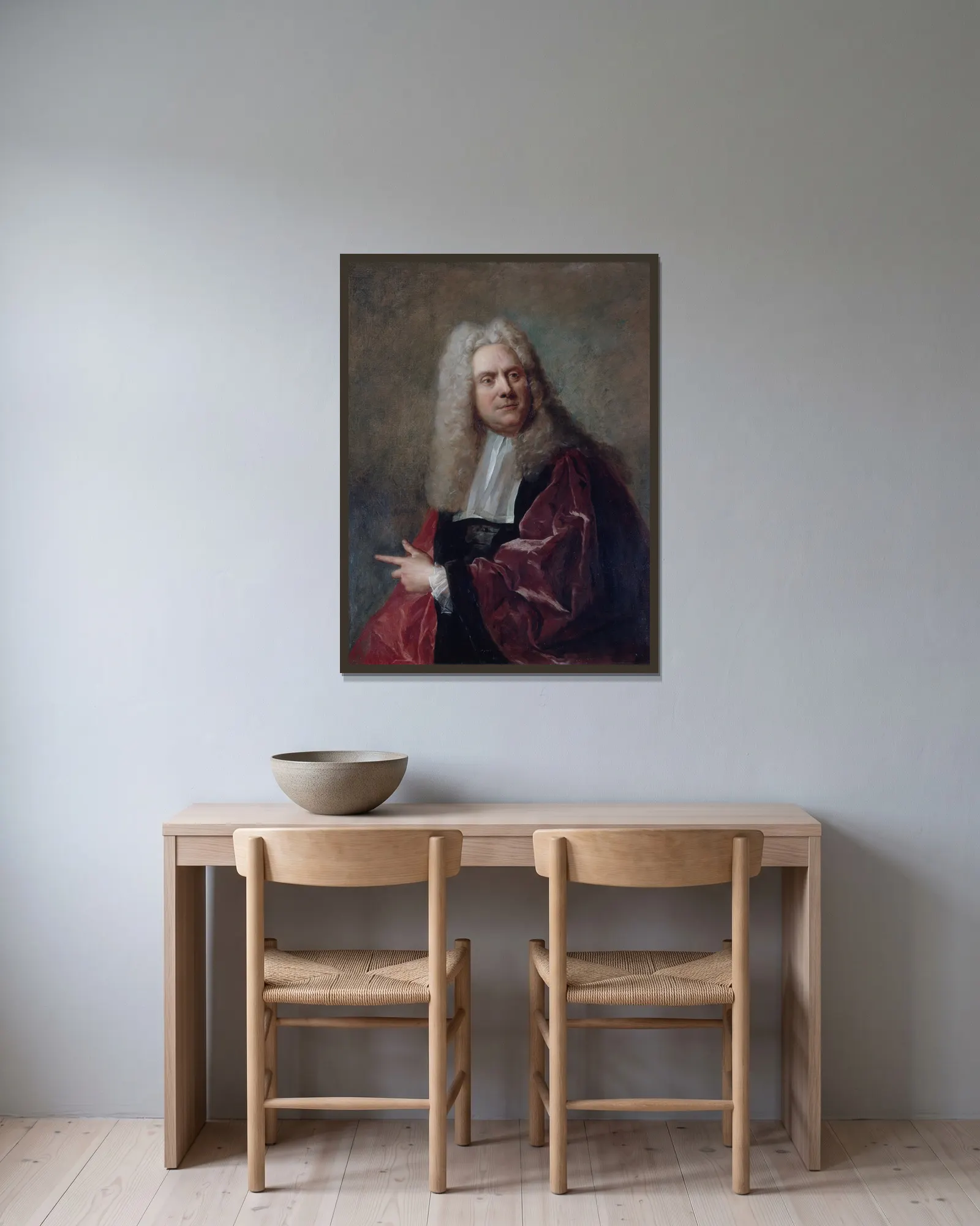 Portrait d’un échevin av Jean-François de Troy inramad på en vägg