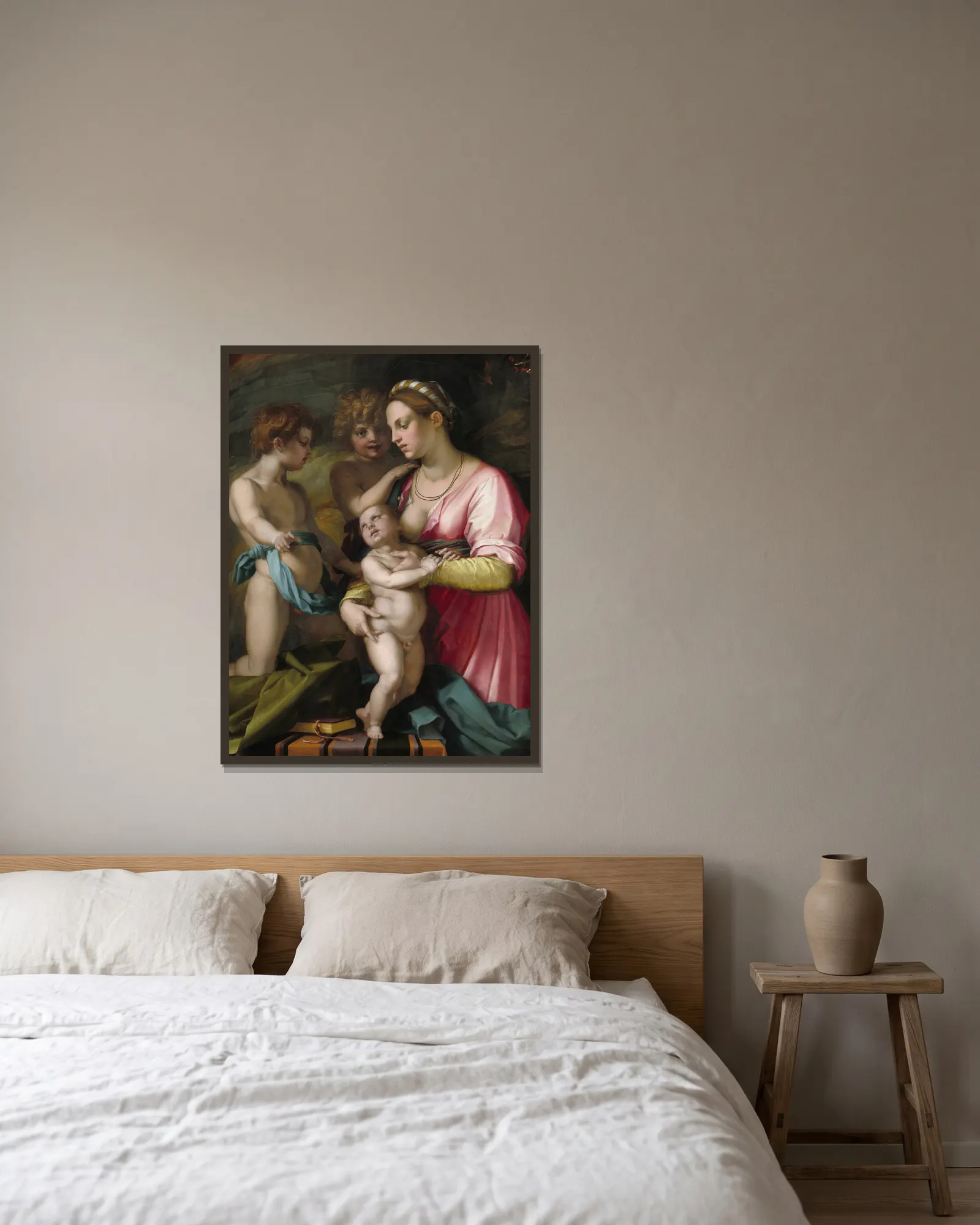 Charity av Andrea del Sarto inramad på en vägg