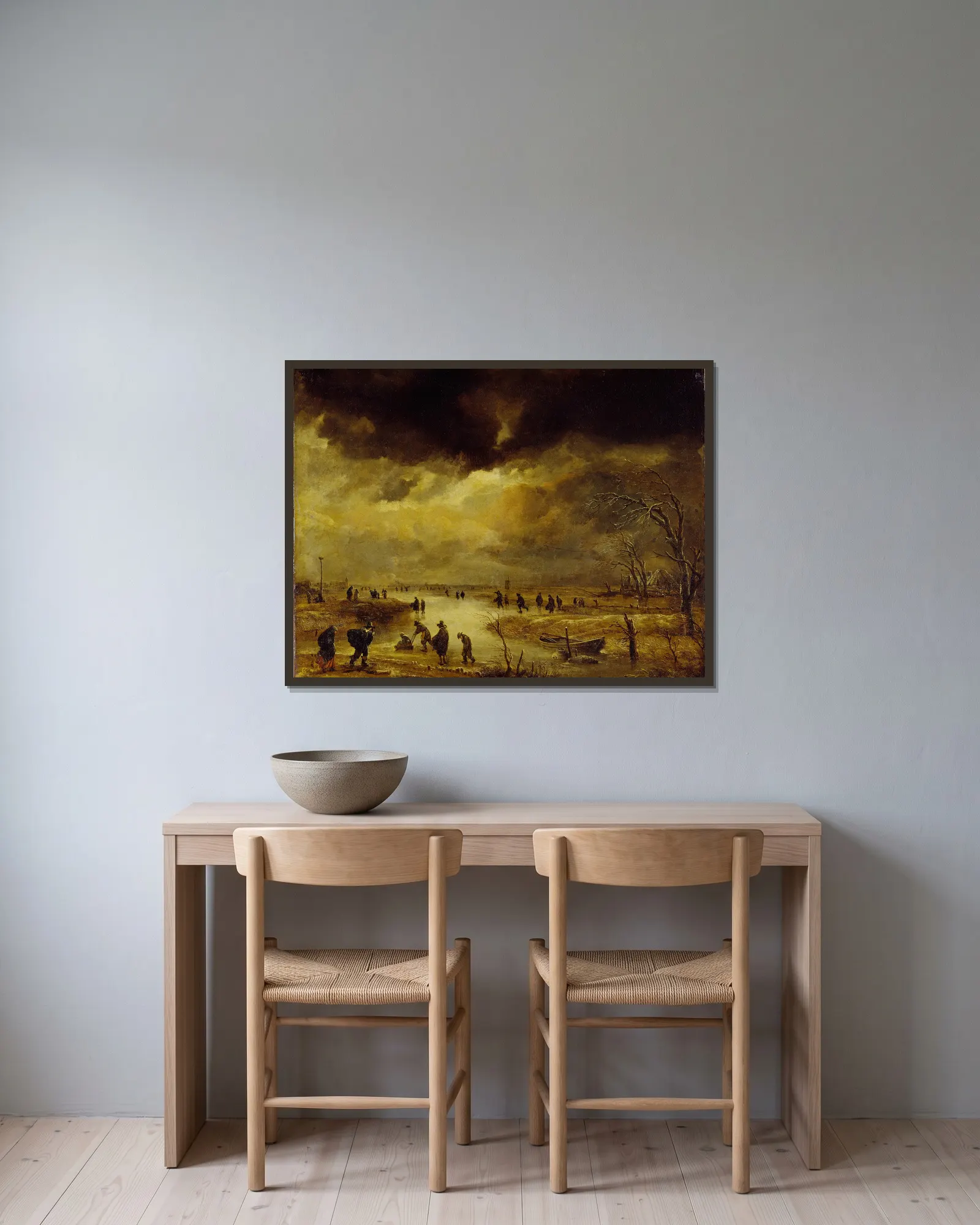 A Winter Scene av Aert van der Neer inramad på en vägg