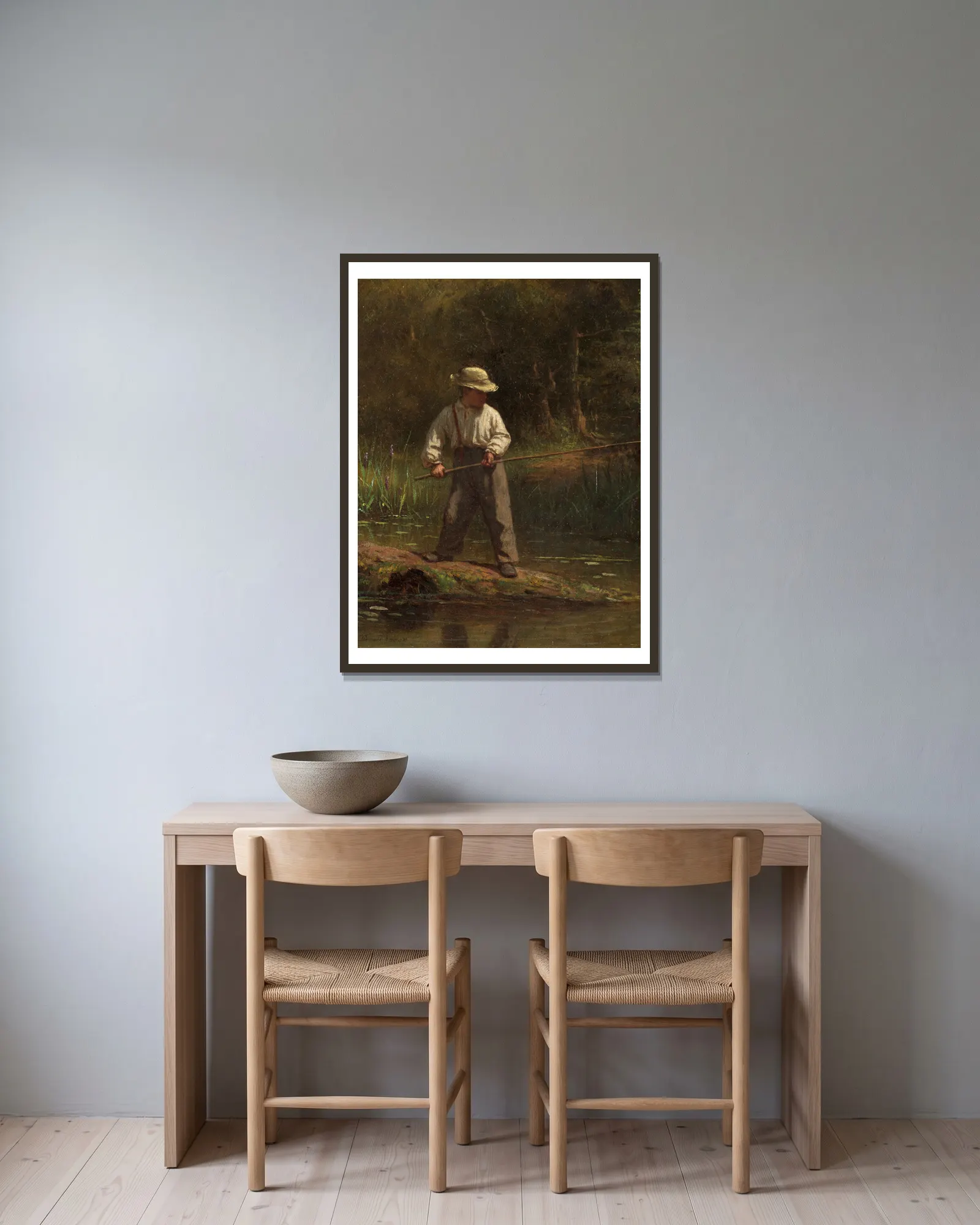Boy Fishing av Eastman Johnson inramad på en vägg