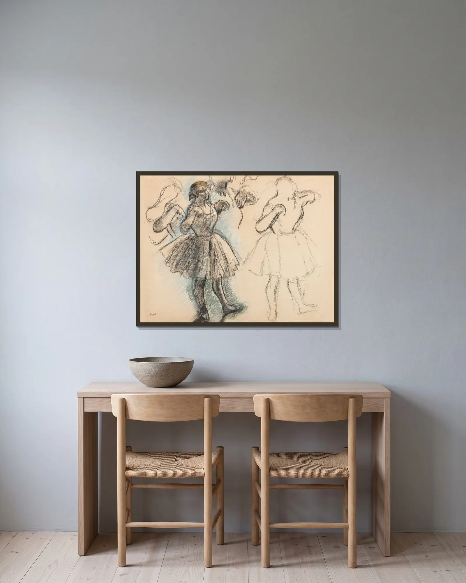 Danseuses av Edgar Degas inramad på en vägg