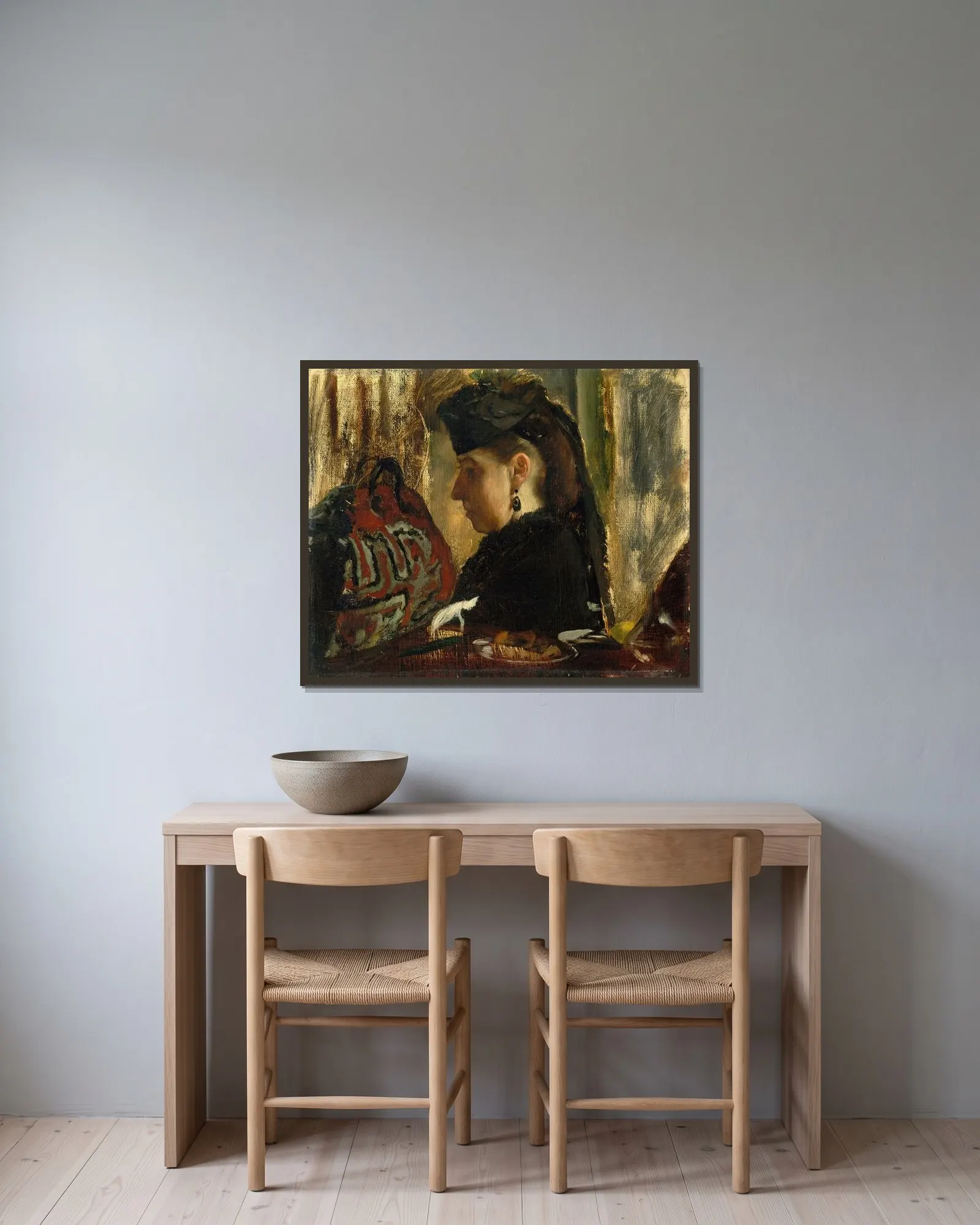 Marie Dihau (1843–1935) av Edgar Degas inramad på en vägg