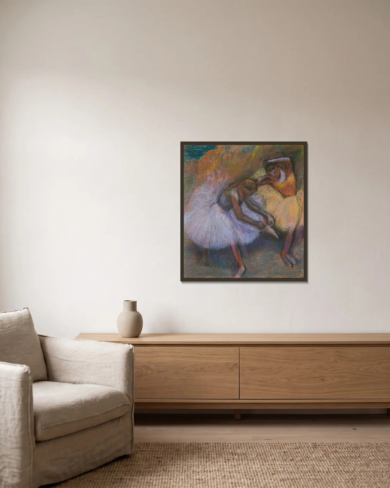 Two Dancers av Edgar Degas inramad på en vägg