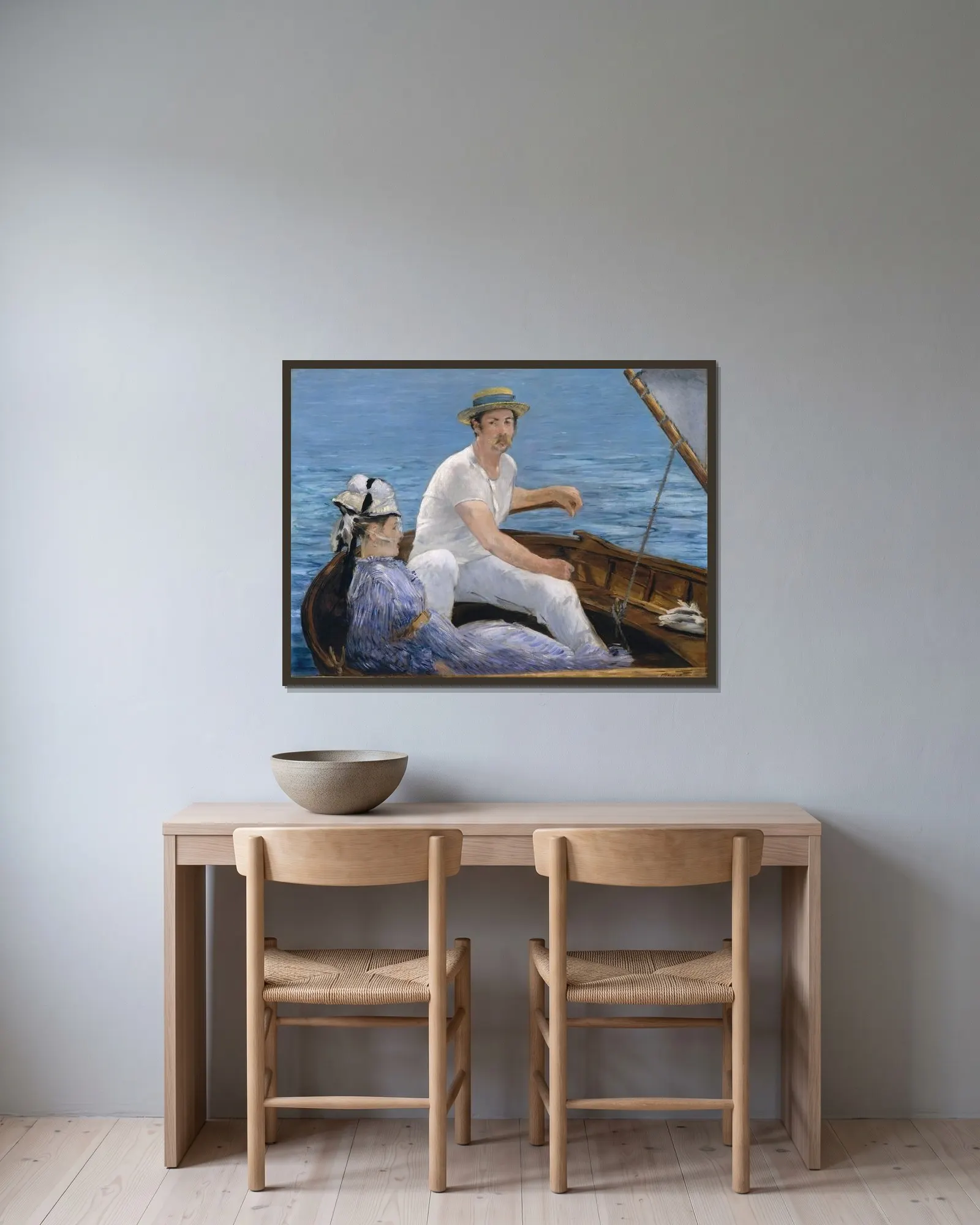 Boating av Édouard Manet inramad på en vägg