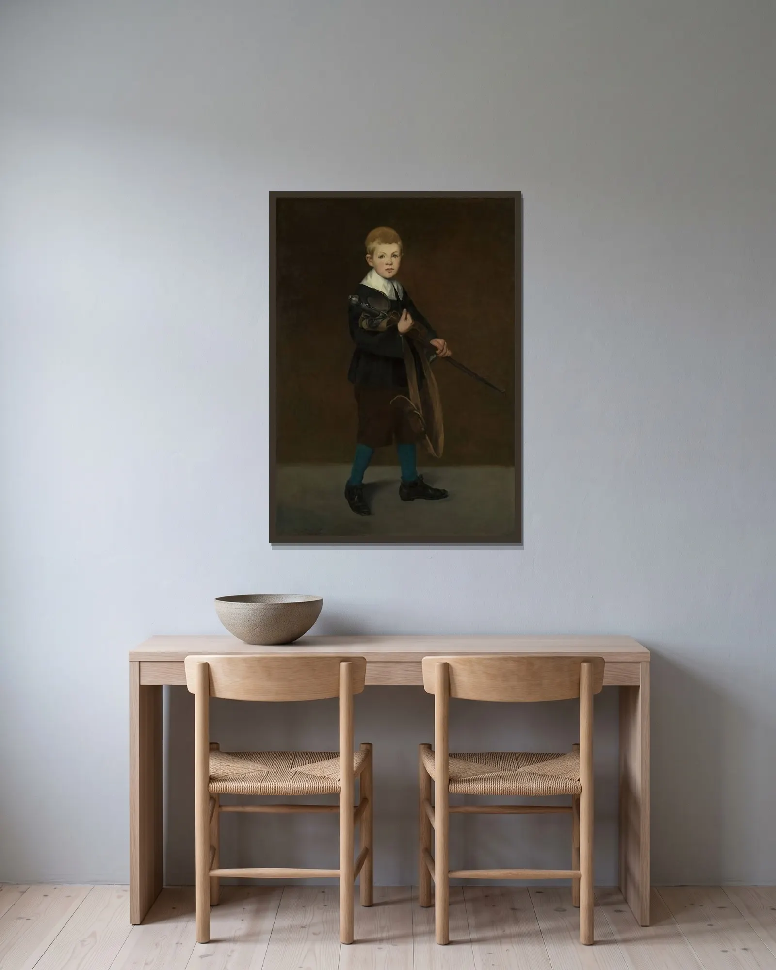 Boy with a Sword av Édouard Manet inramad på en vägg