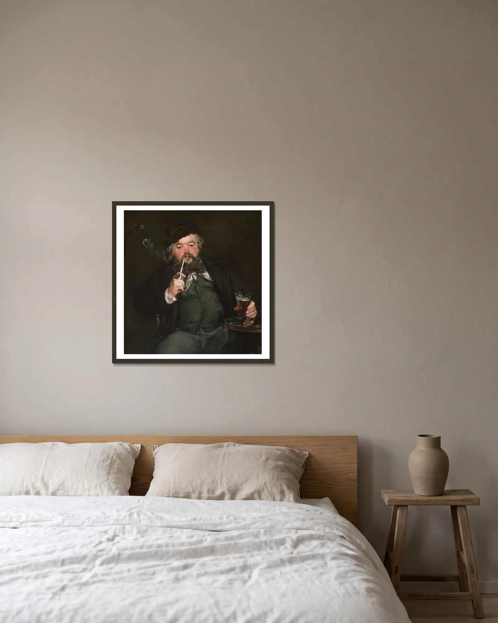 Le Bon Bock av Édouard Manet inramad på en vägg