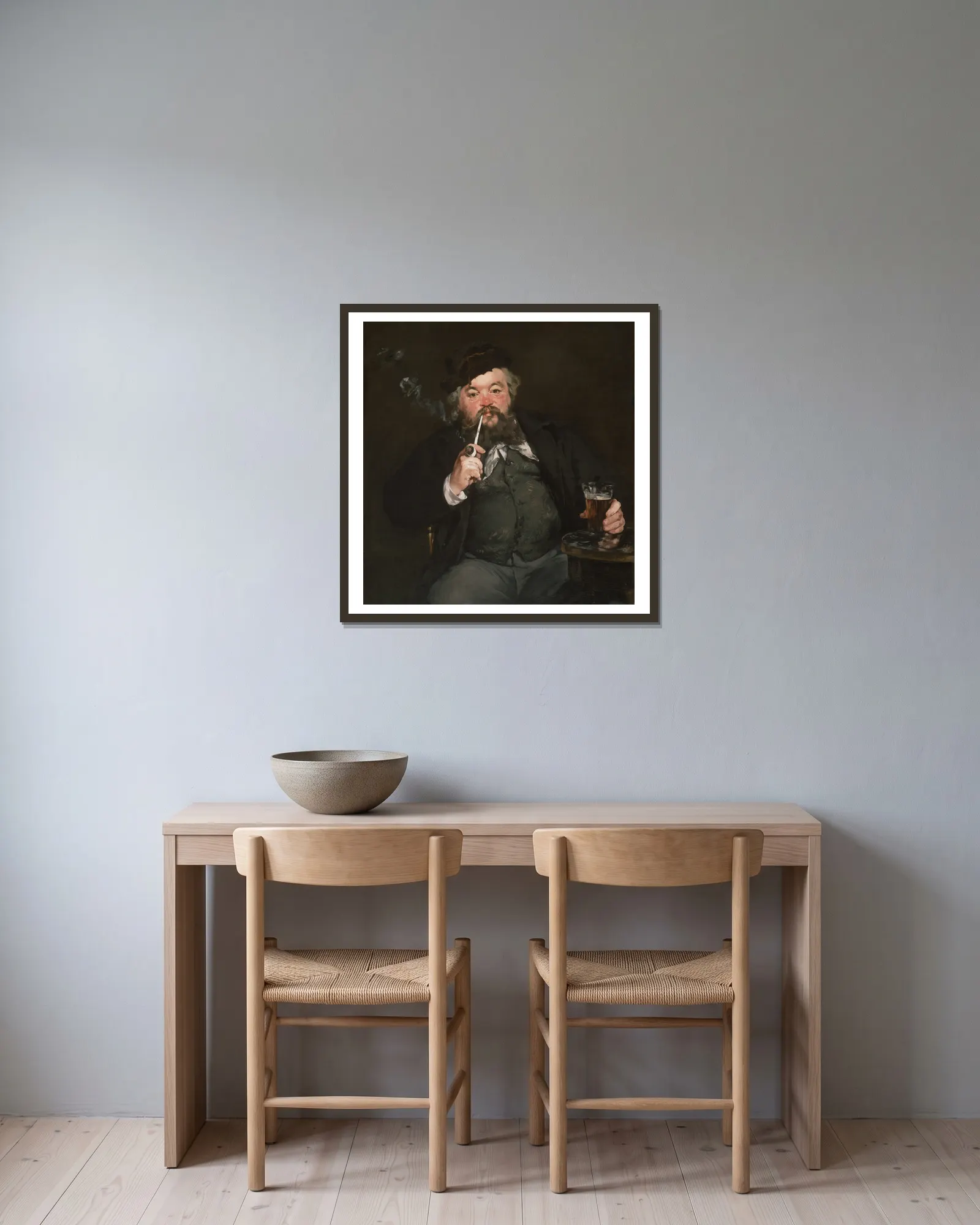 Le Bon Bock av Édouard Manet inramad på en vägg