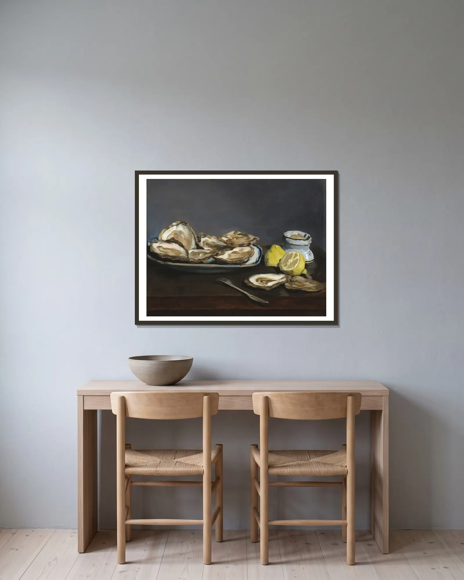 Oysters av Édouard Manet inramad på en vägg