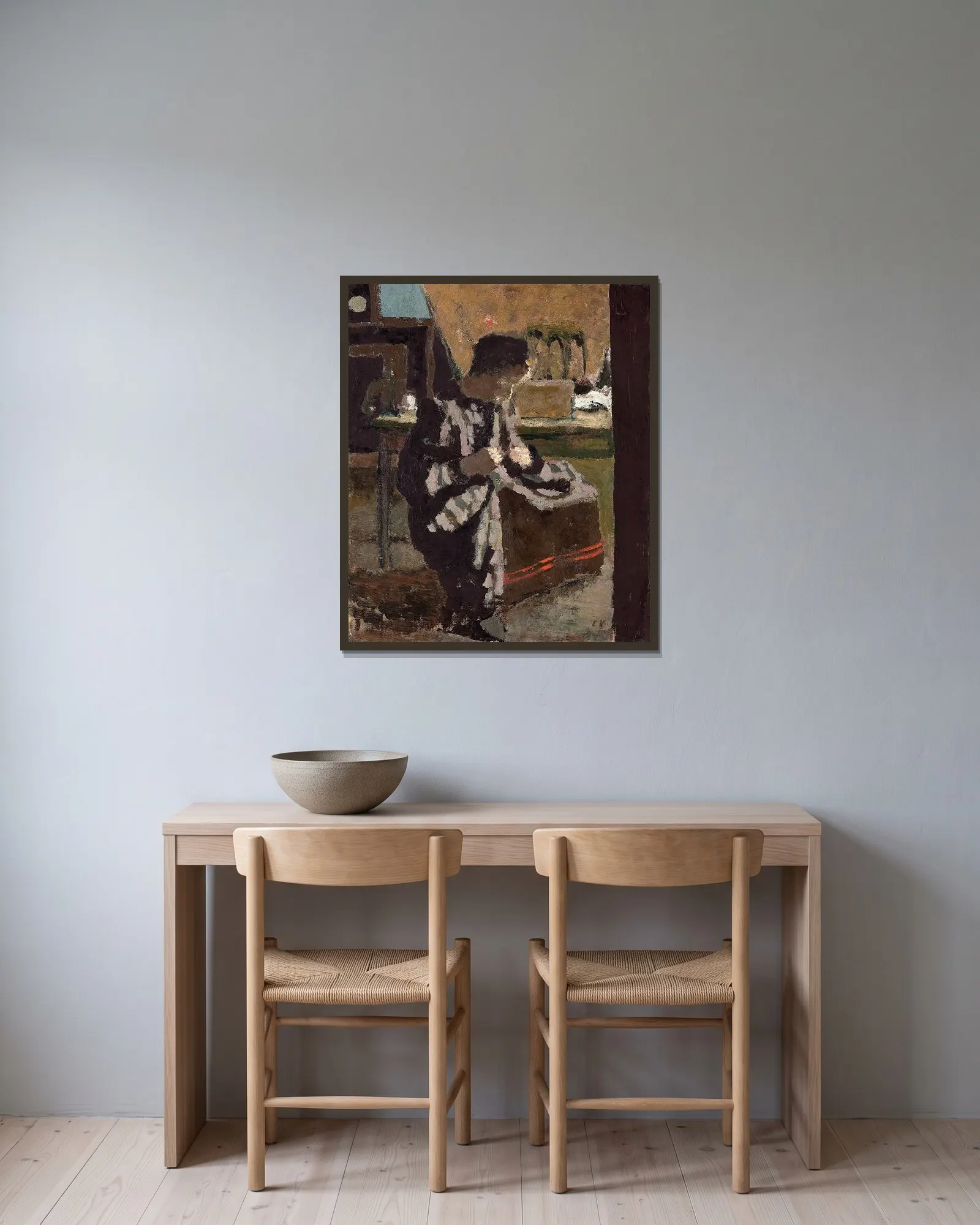 La couture av Édouard Vuillard inramad på en vägg