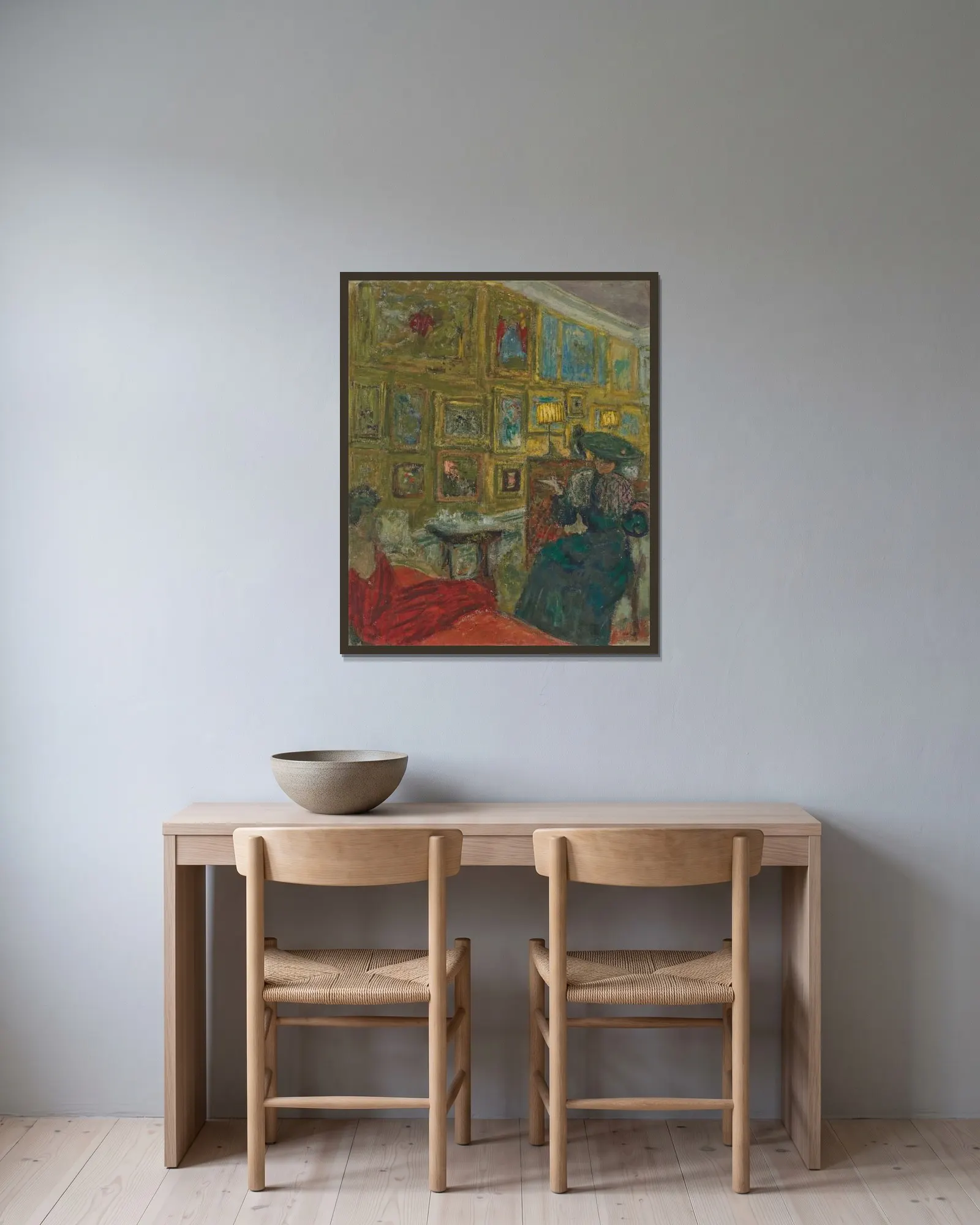 La visiteuse av Édouard Vuillard inramad på en vägg