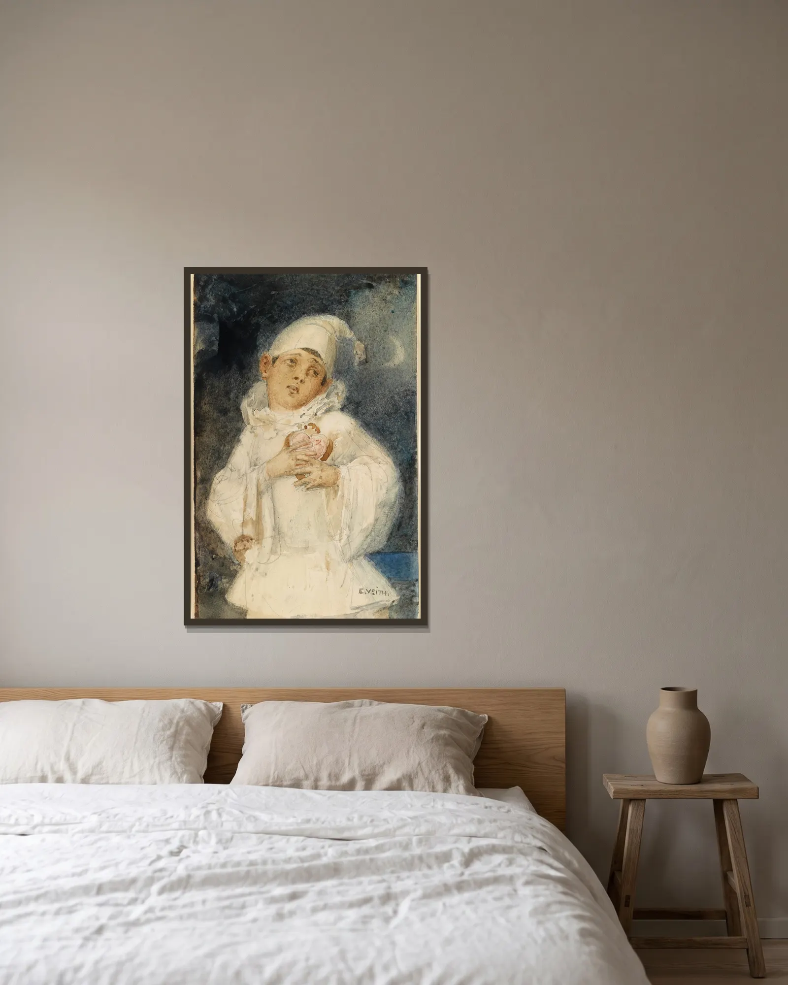 Harlekin av Eduard Veith inramad på en vägg