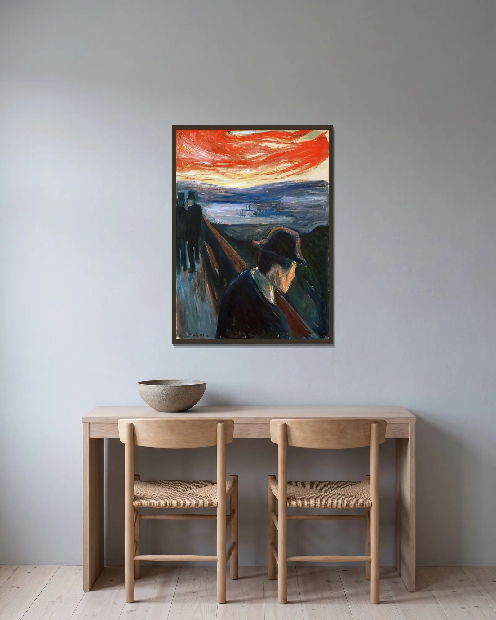 Despair av Edvard Munch inramad på en vägg