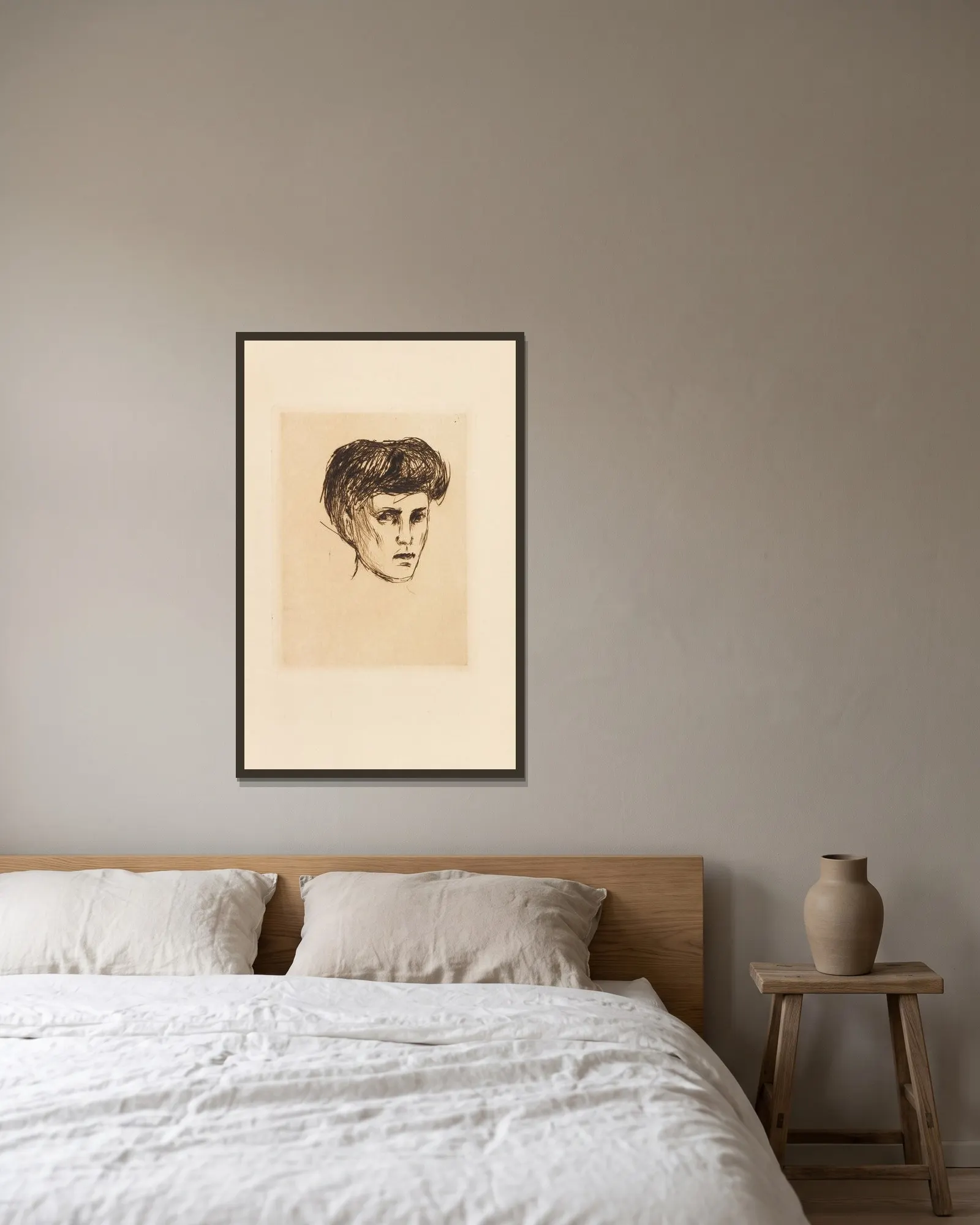 Frauenkopf av Edvard Munch inramad på en vägg