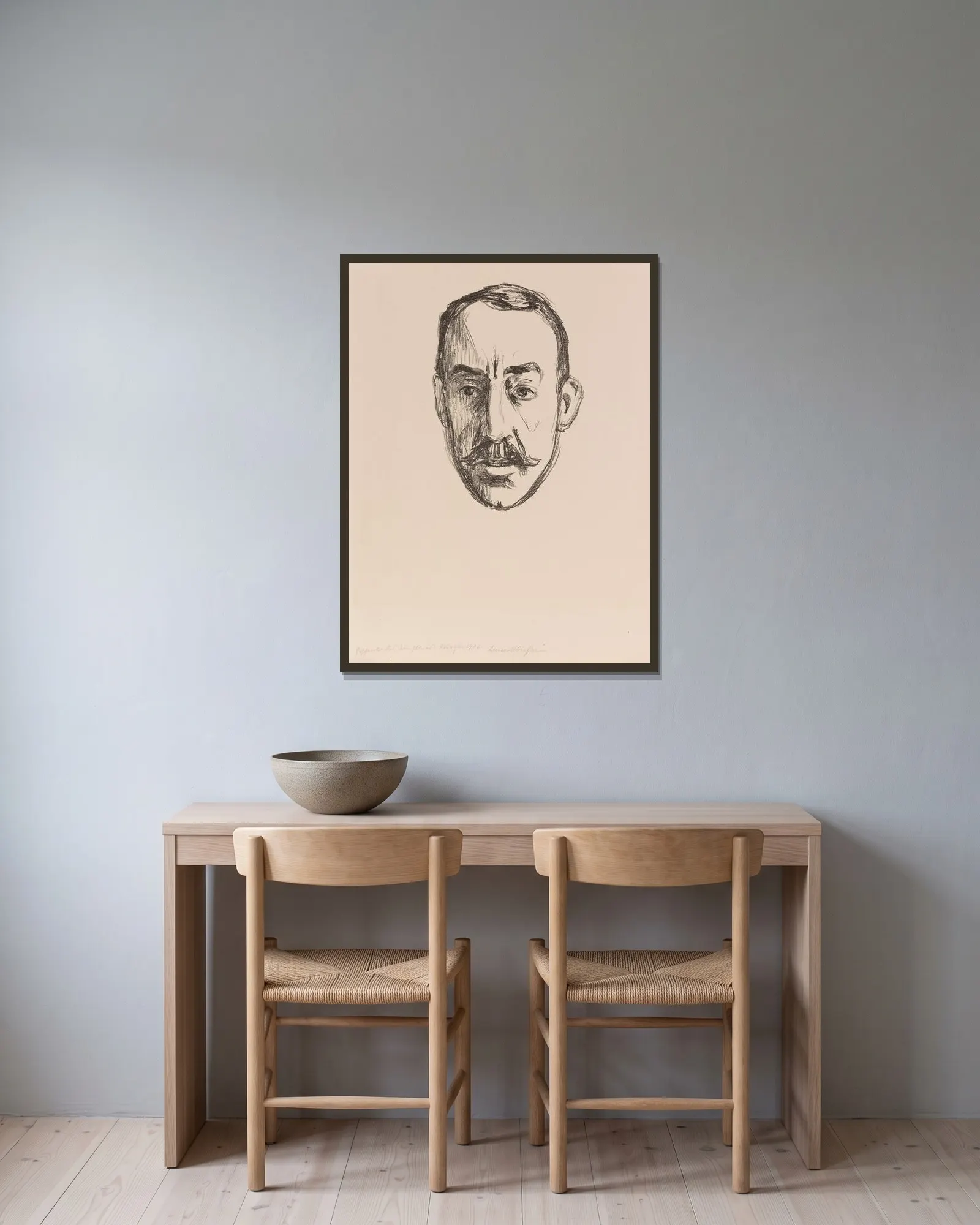 Henry van de Velde av Edvard Munch inramad på en vägg