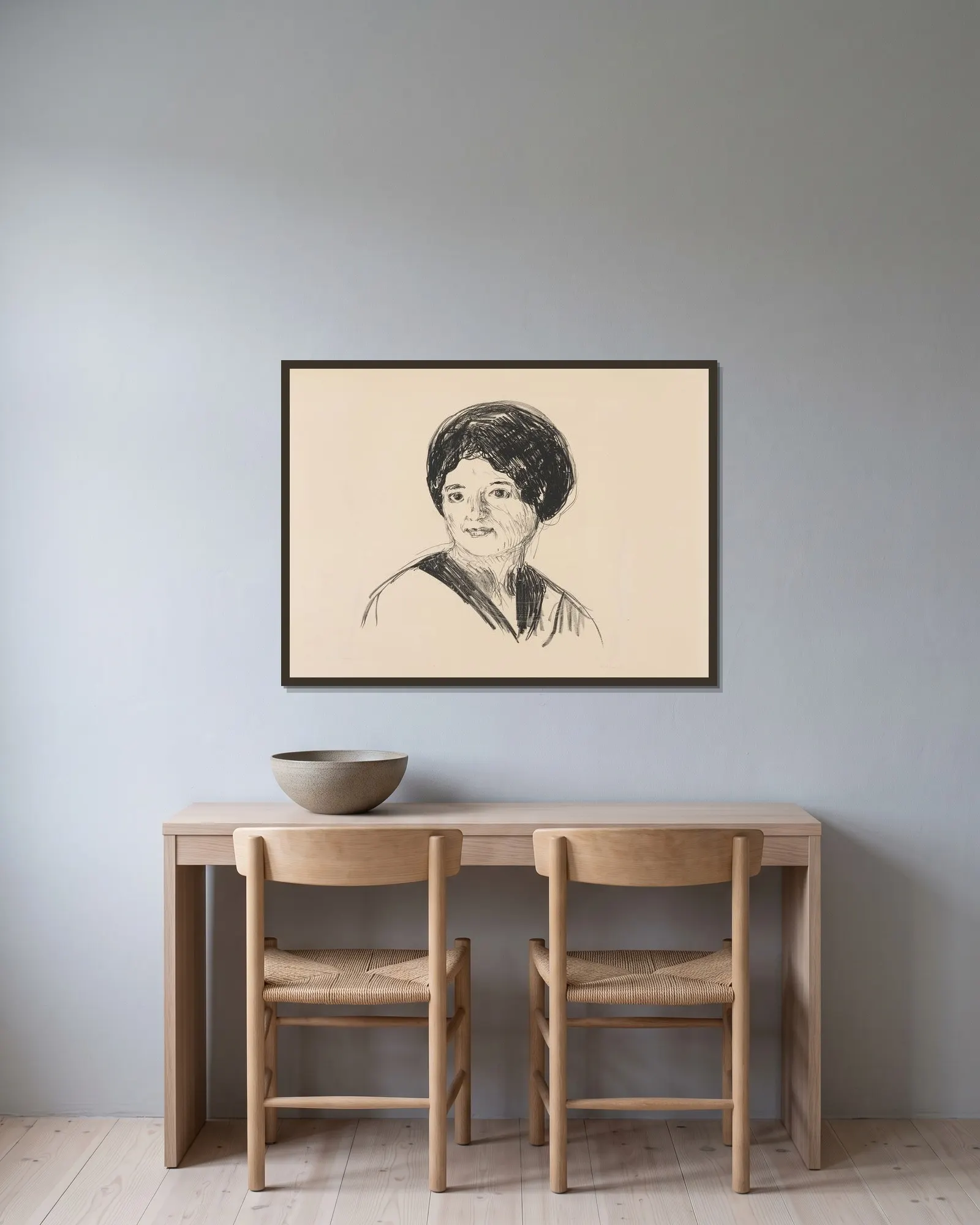 Junge Frau (Ung kvinne) av Edvard Munch inramad på en vägg