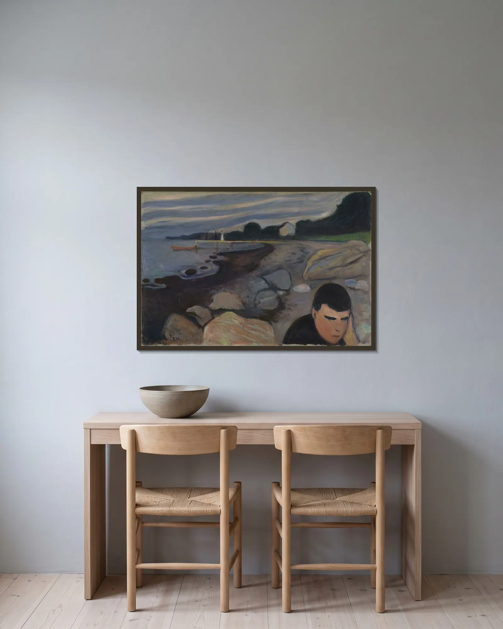 Melancholy av Edvard Munch inramad på en vägg