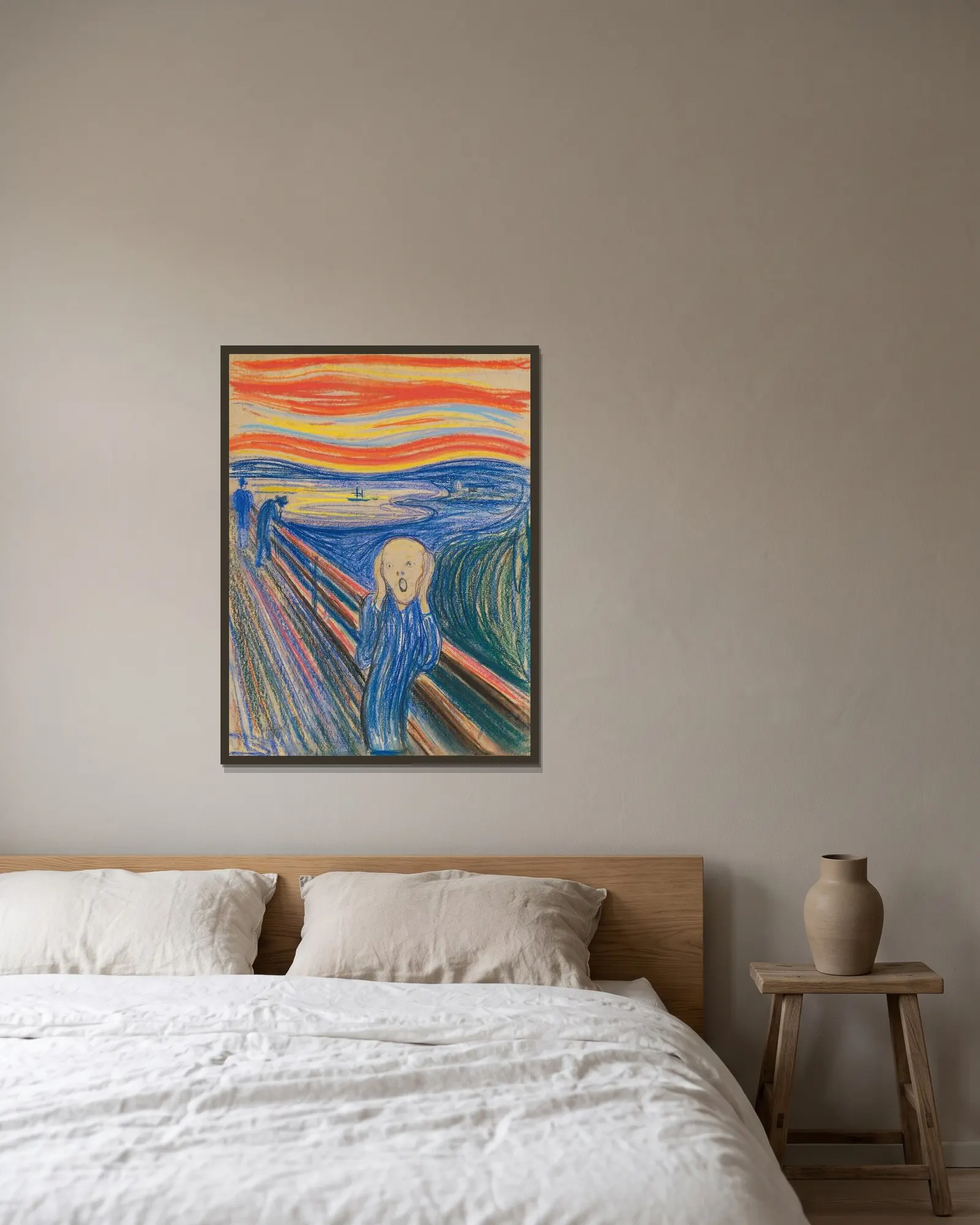 The Scream av Edvard Munch inramad på en vägg