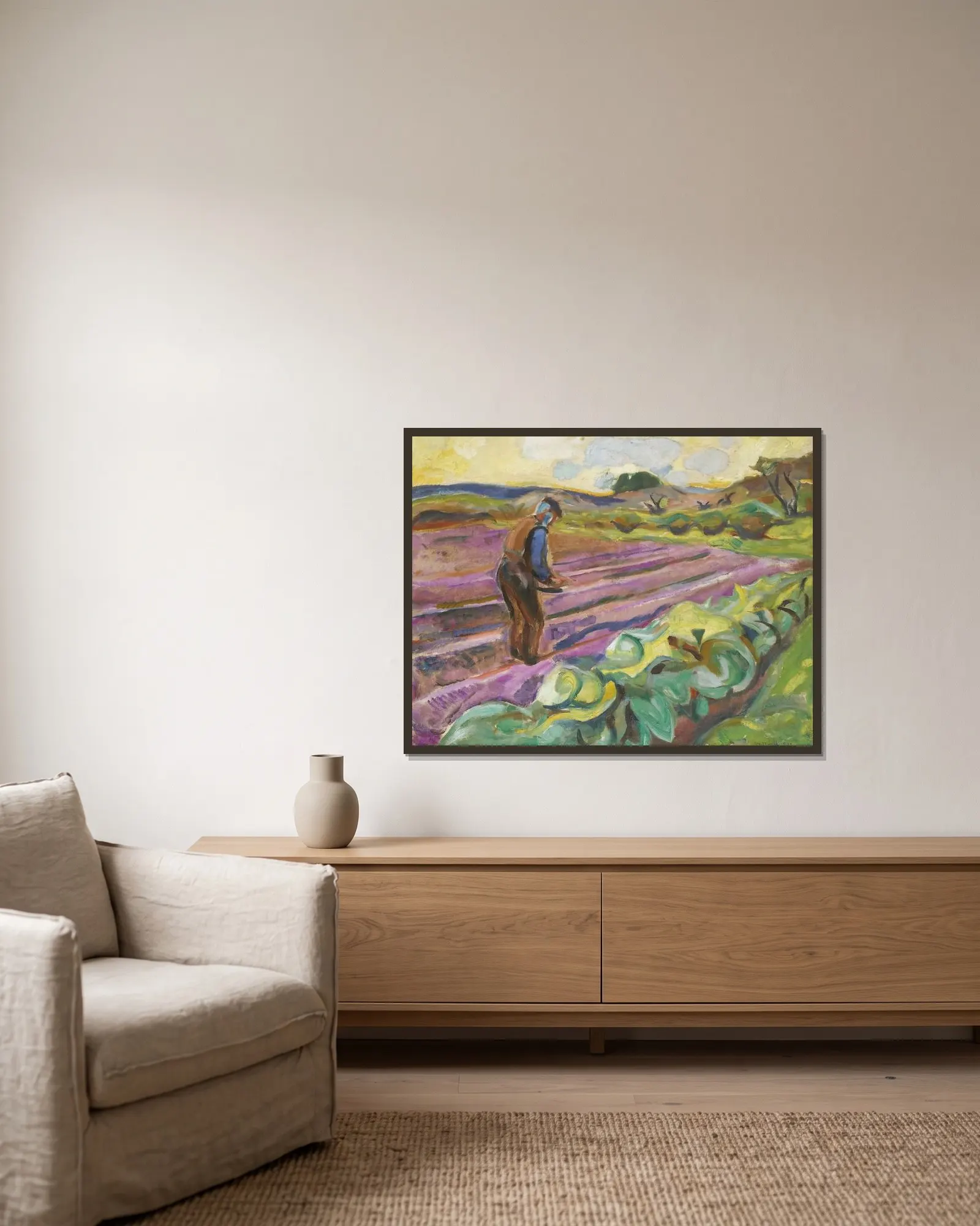 The Sower av Edvard Munch inramad på en vägg