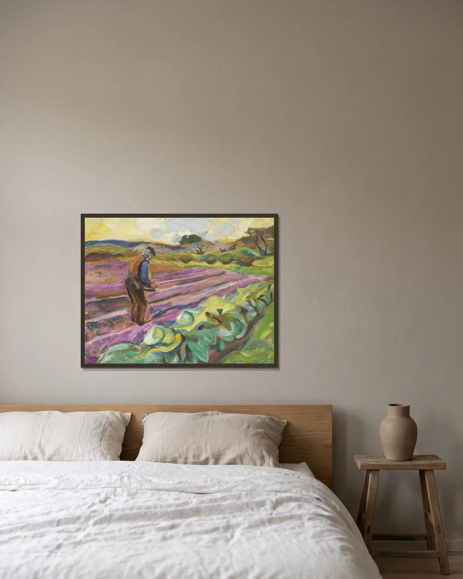 The Sower av Edvard Munch inramad på en vägg