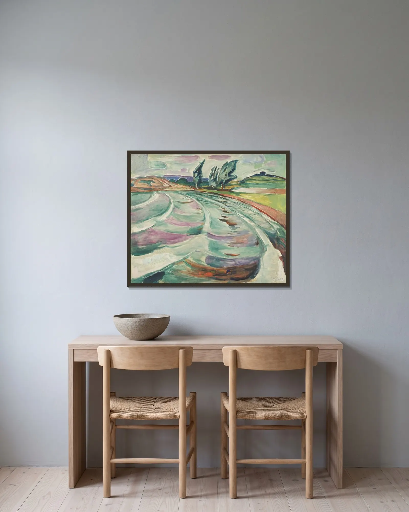 The Wave av Edvard Munch inramad på en vägg
