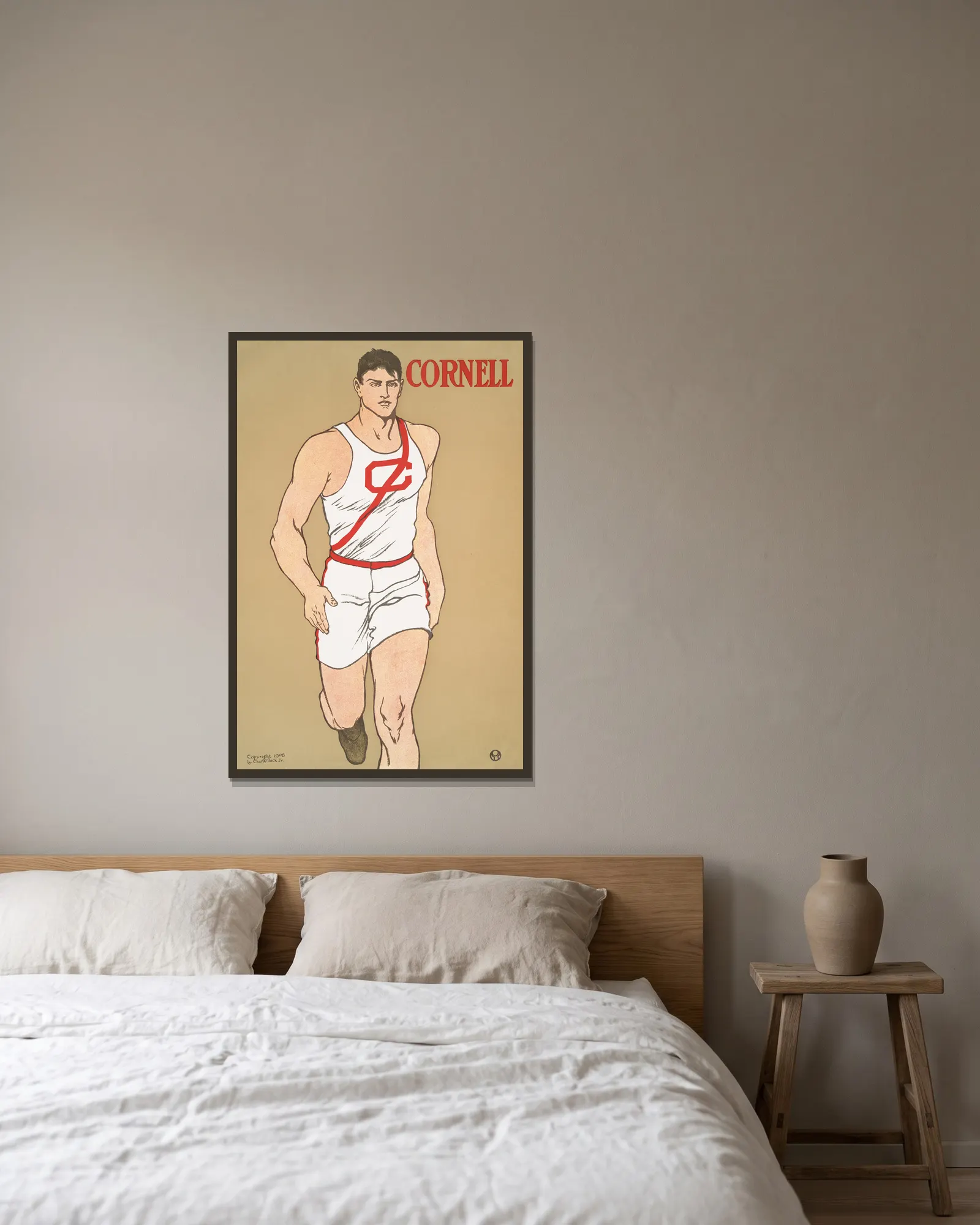 Cornell av Edward Penfield inramad på en vägg