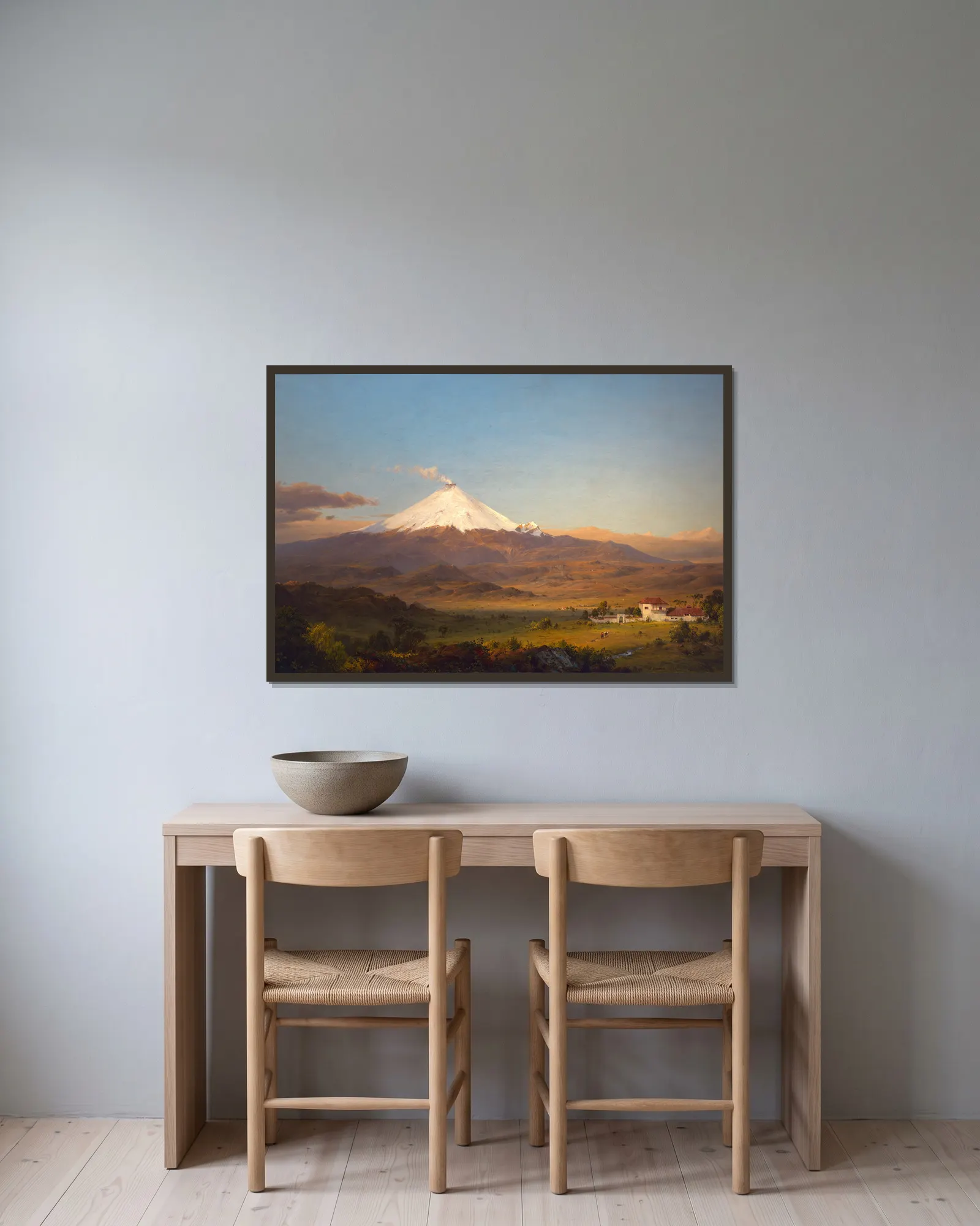 Cotopaxi av Frederic Edwin Church inramad på en vägg