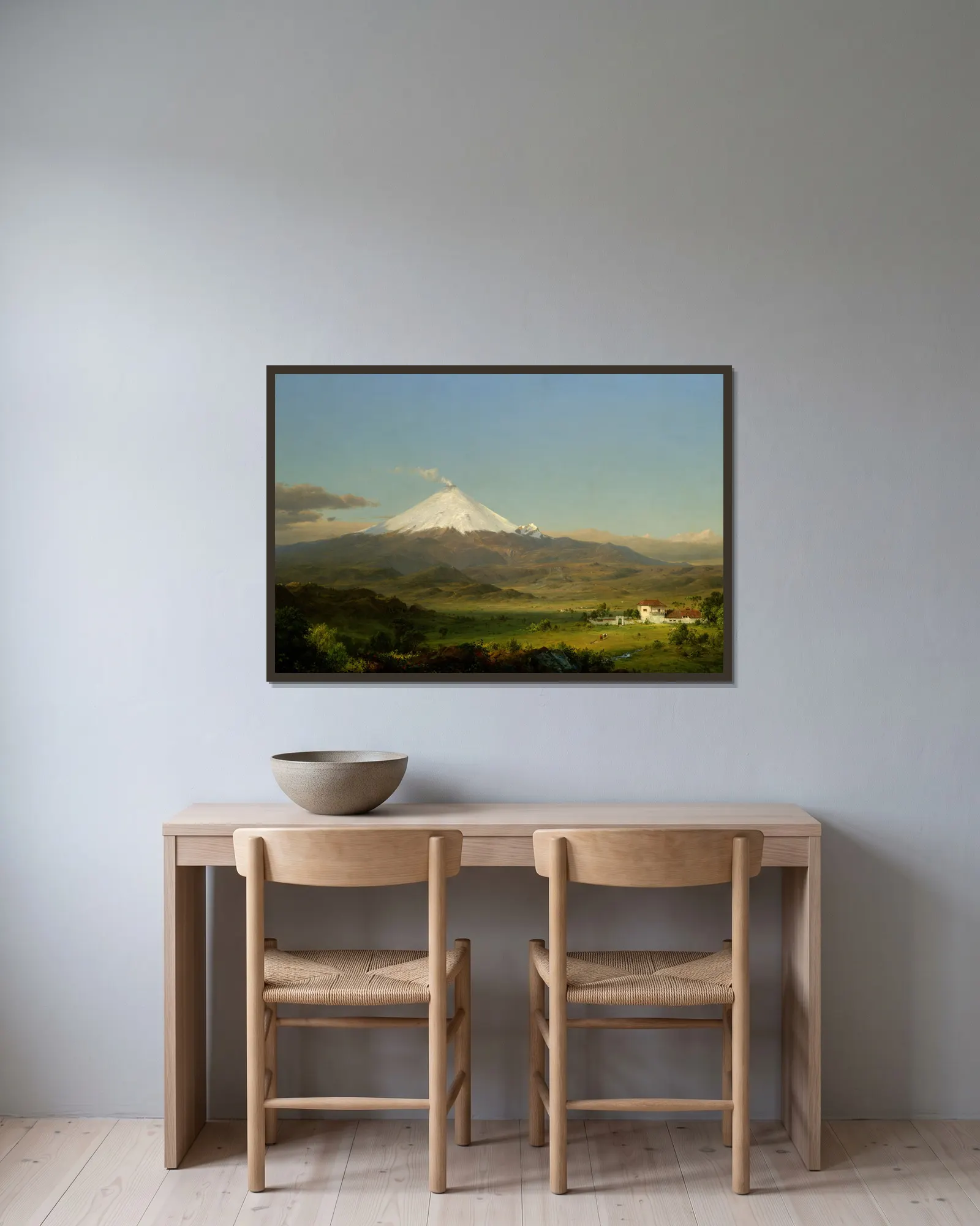 Cotopaxi av Frederic Edwin Church inramad på en vägg