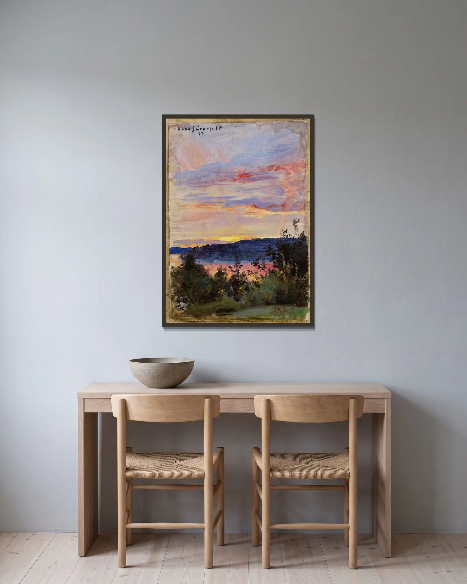 Sunset av Eero Järnefelt inramad på en vägg