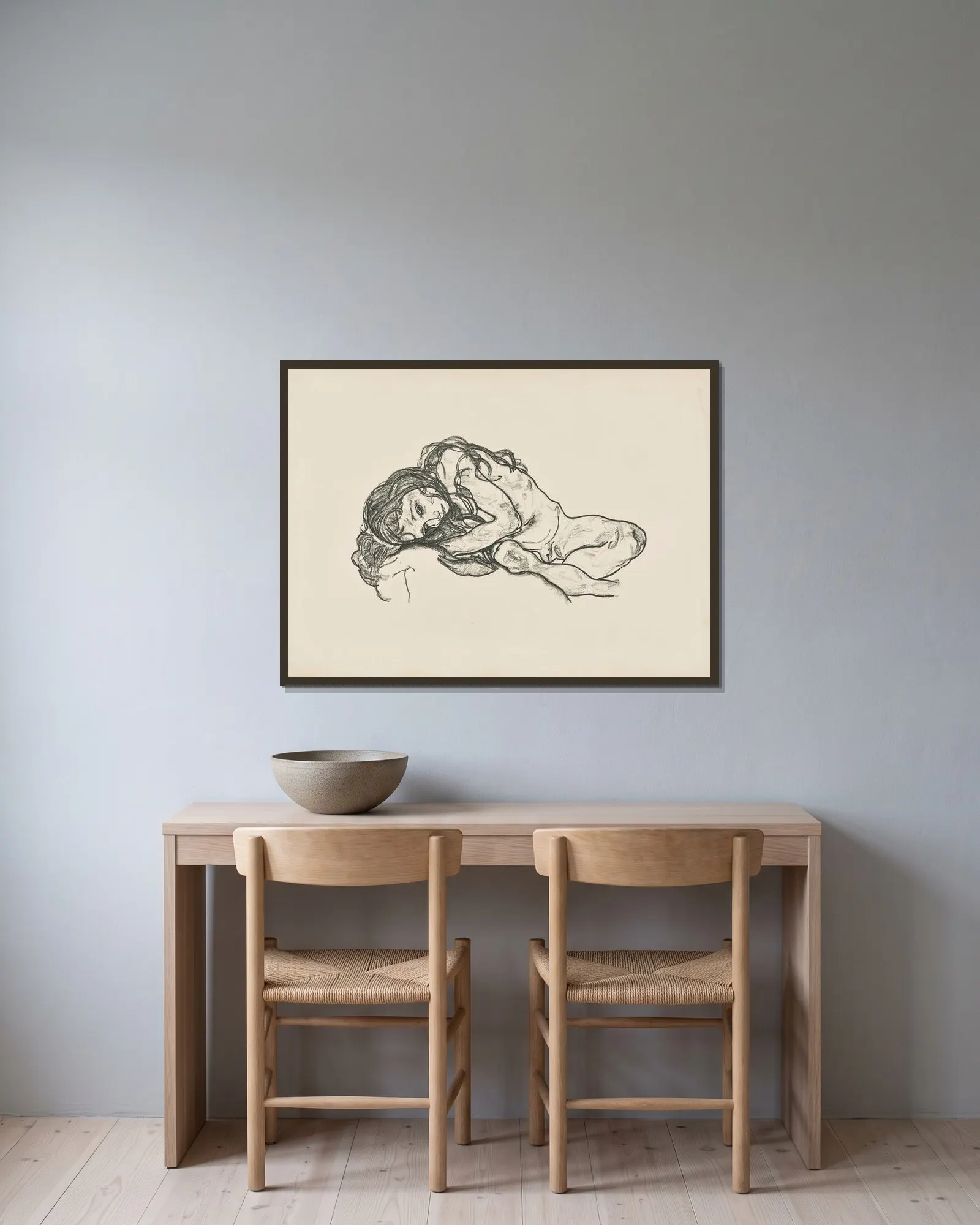 Girl (Mädchen) av Egon Schiele inramad på en vägg