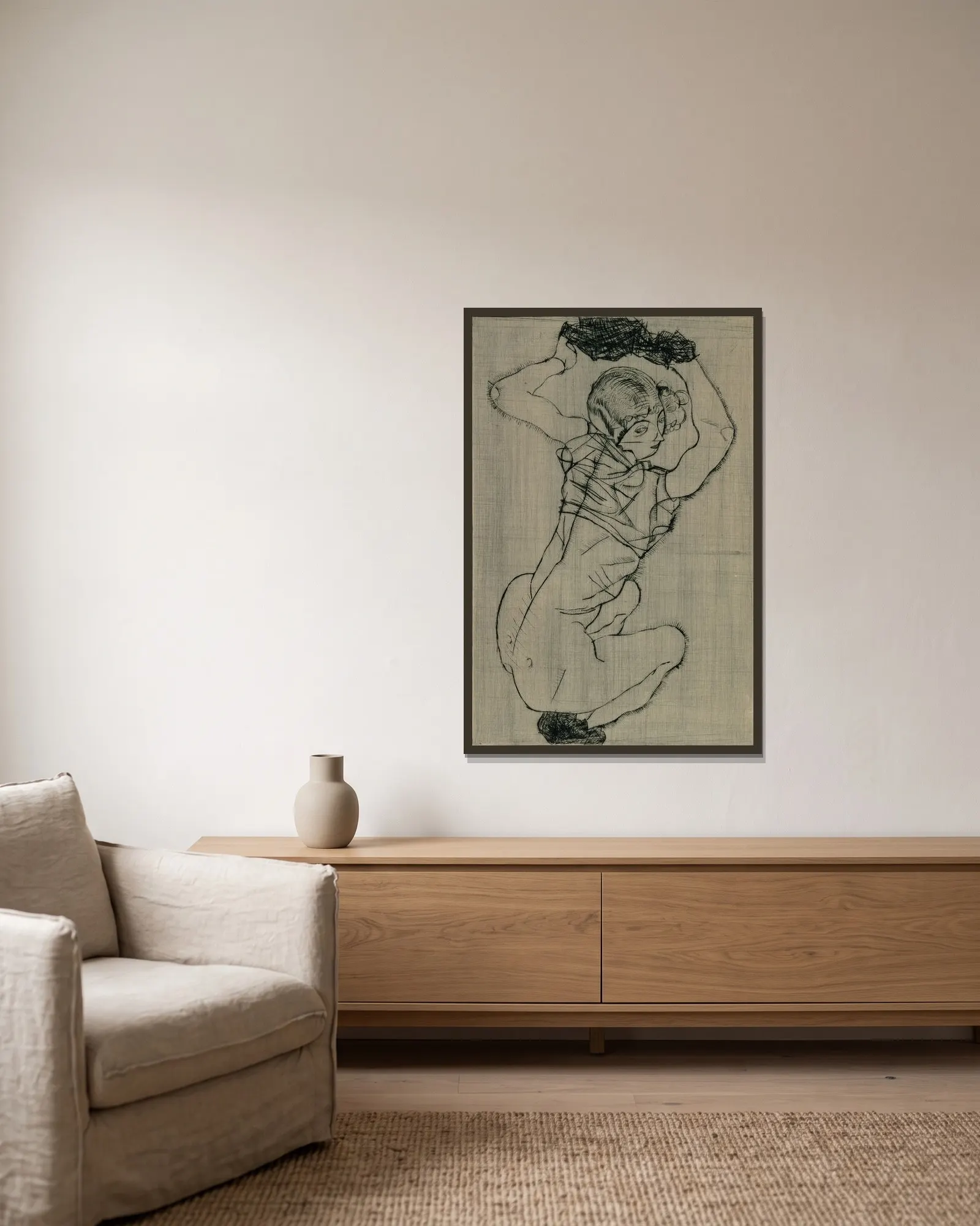 Kauernde av Egon Schiele inramad på en vägg