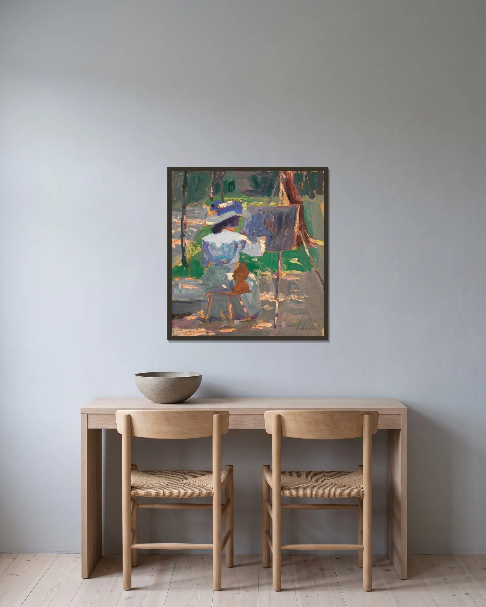Malende Frau av Egon Schiele inramad på en vägg