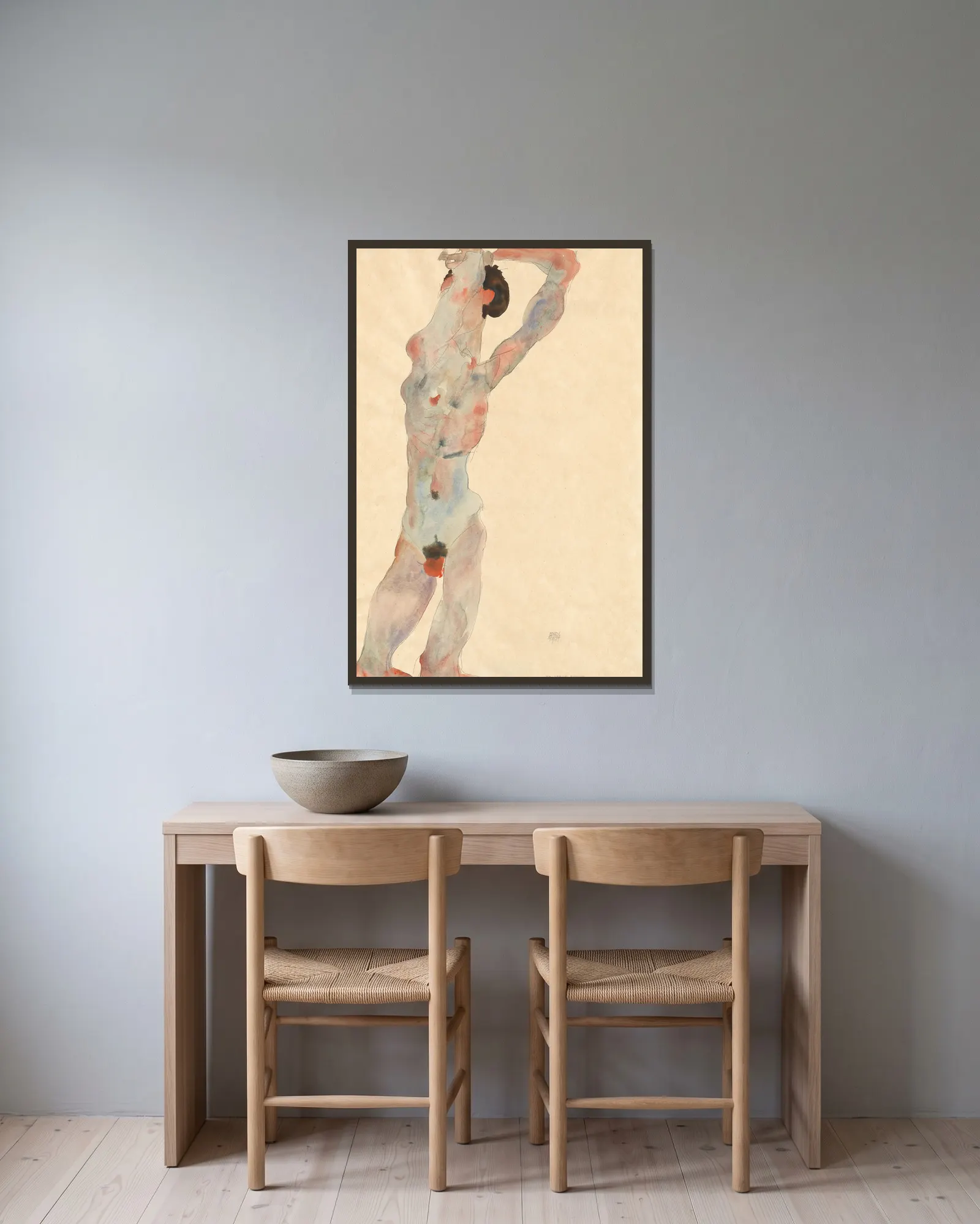 Männlicher Akt av Egon Schiele inramad på en vägg