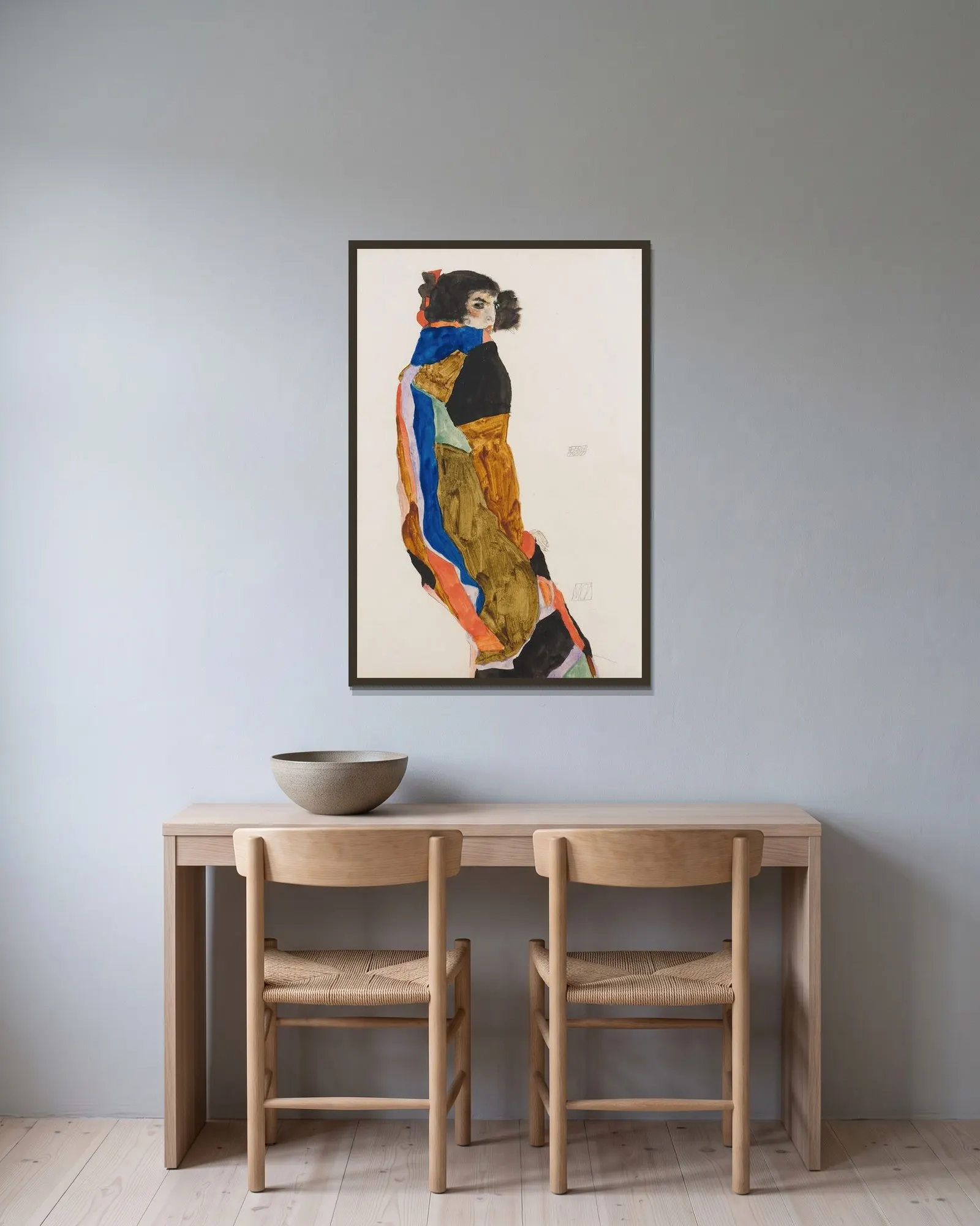 Moa av Egon Schiele inramad på en vägg