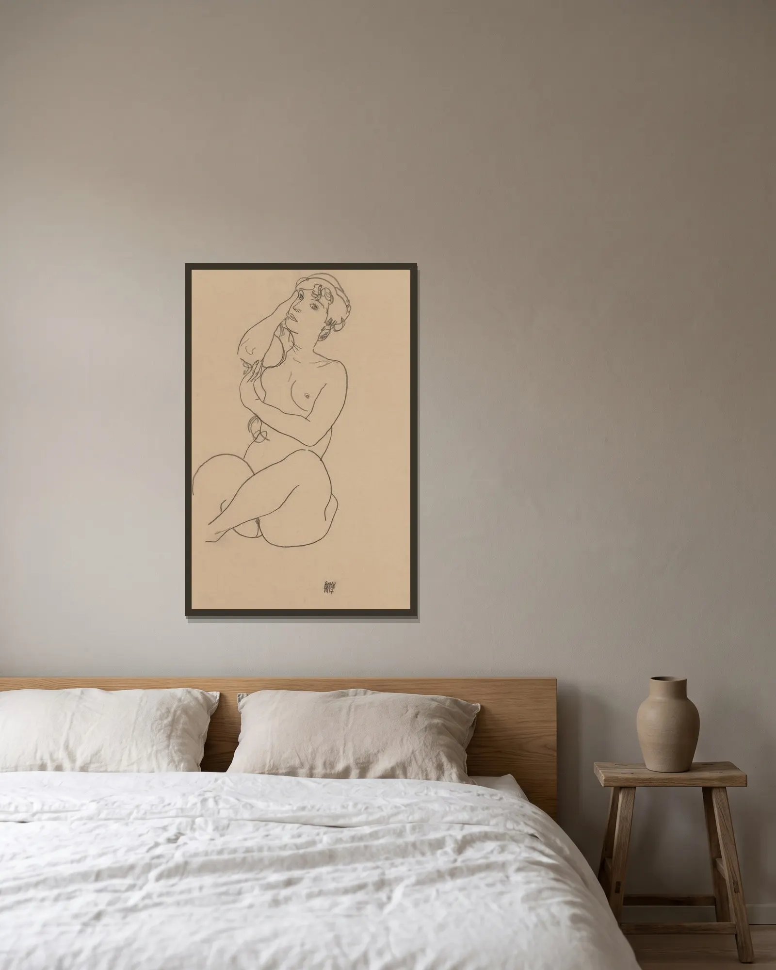Nude av Egon Schiele inramad på en vägg