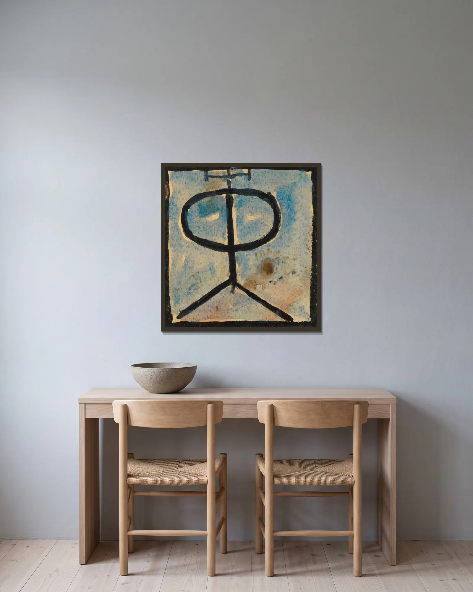 Ornament av Egon Schiele inramad på en vägg