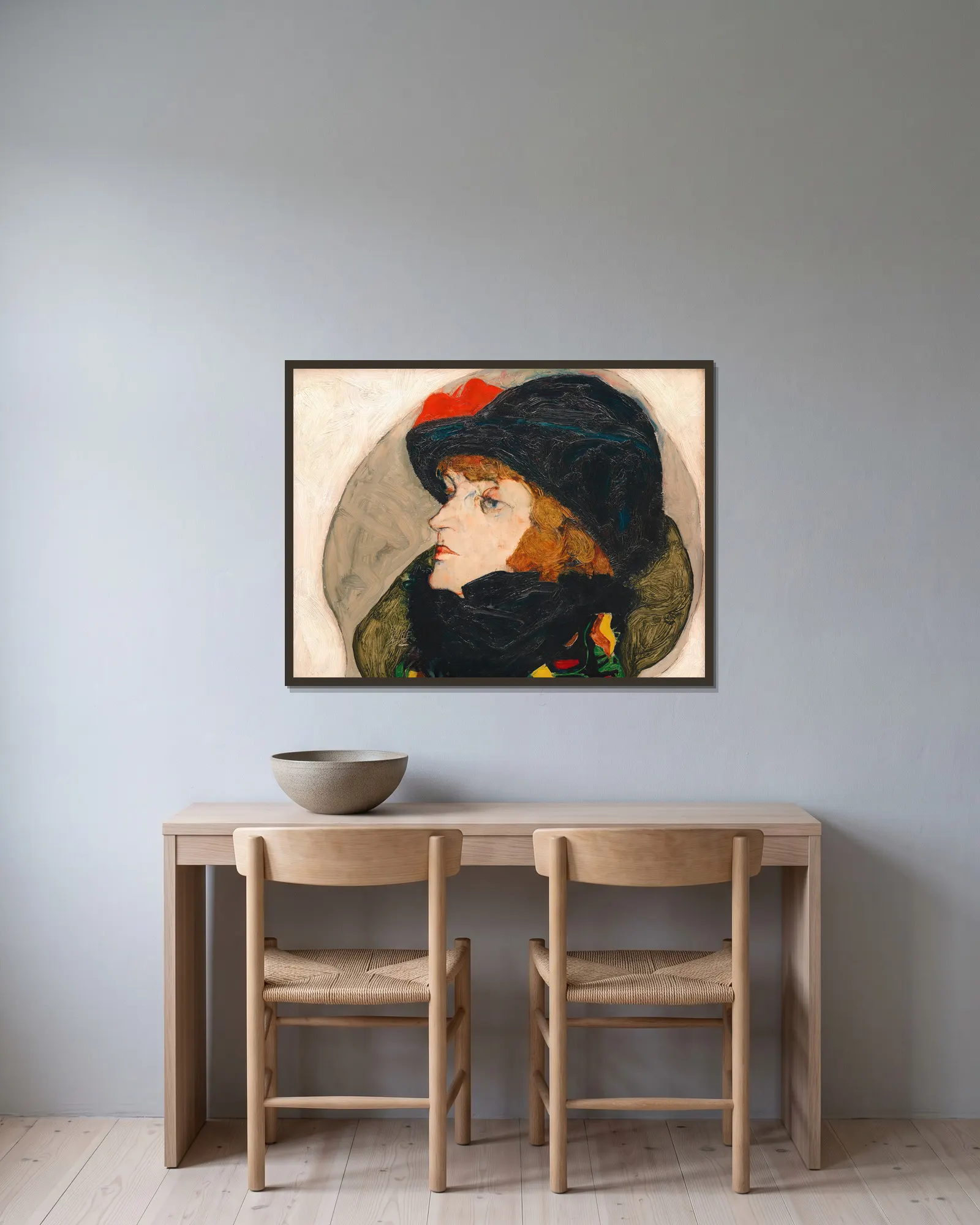Porträt Ida Roessler av Egon Schiele inramad på en vägg