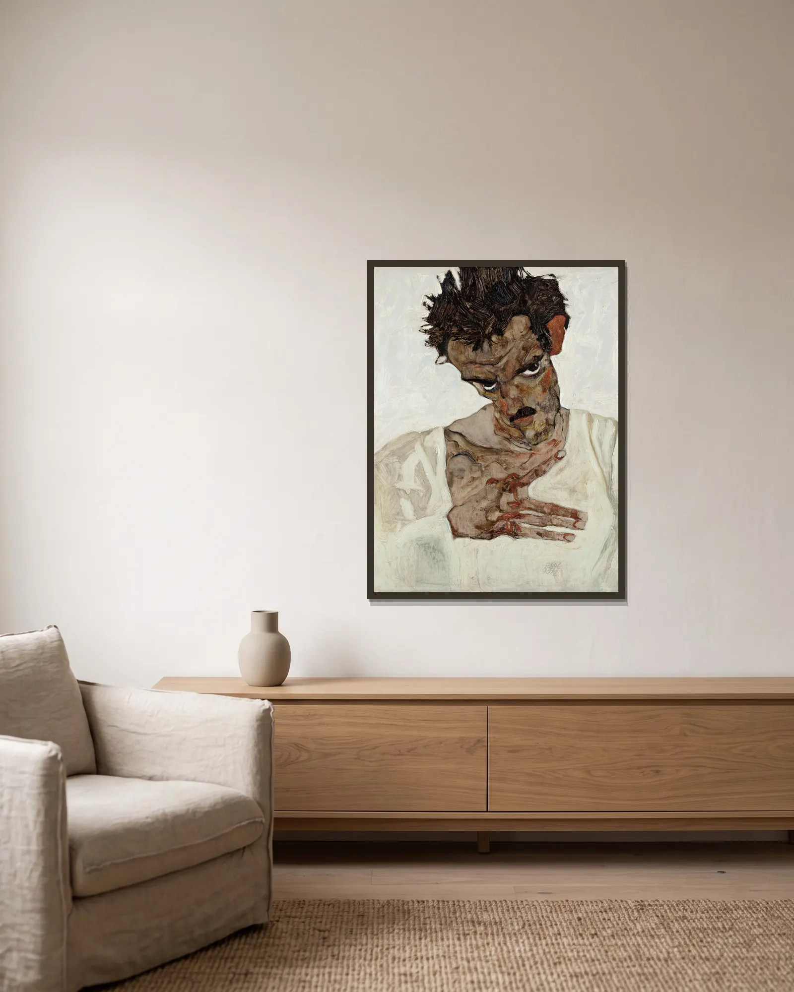 Self-Portrait With Lowered Head av Egon Schiele inramad på en vägg