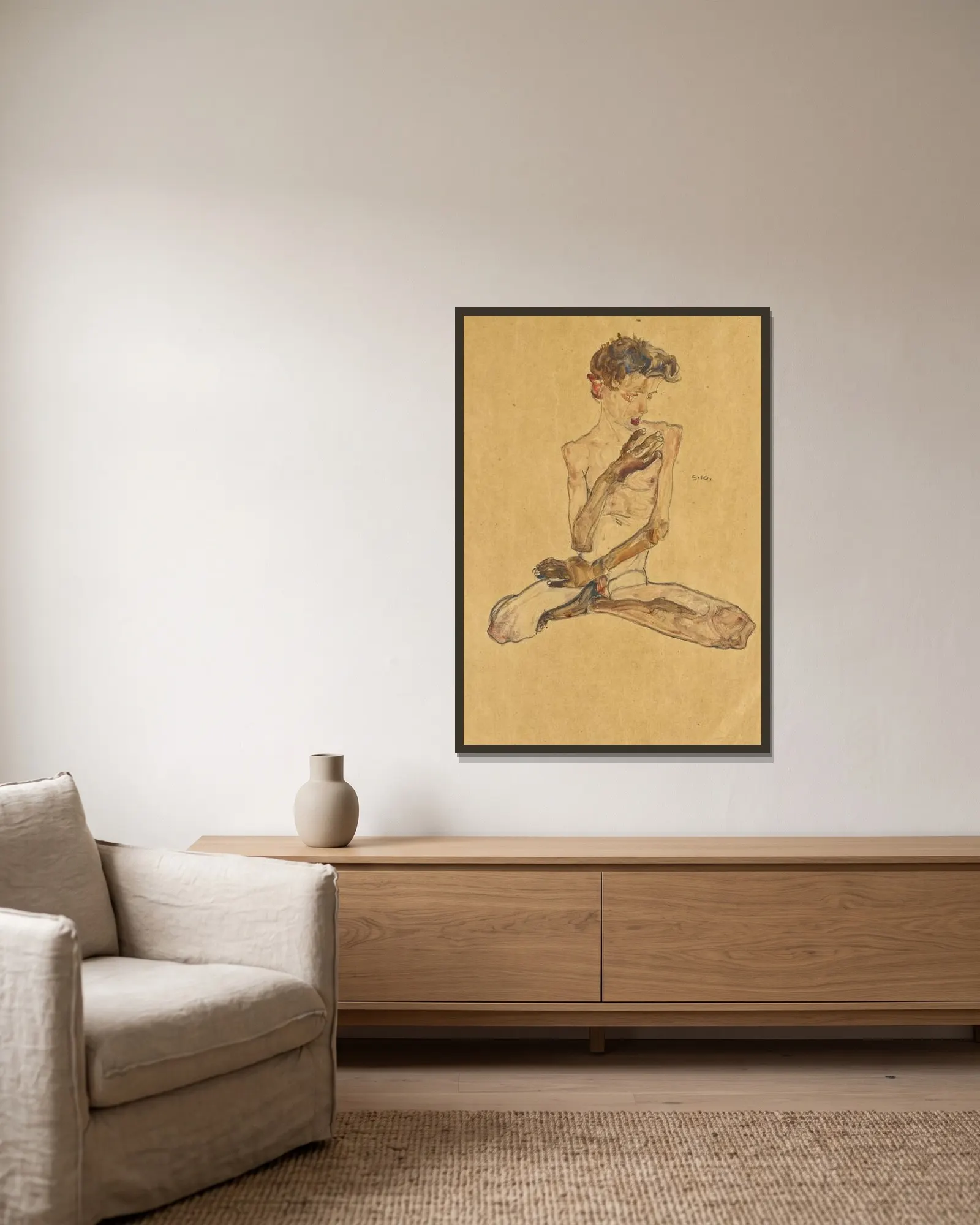 Sitzender Junge (Seated Boy) av Egon Schiele inramad på en vägg