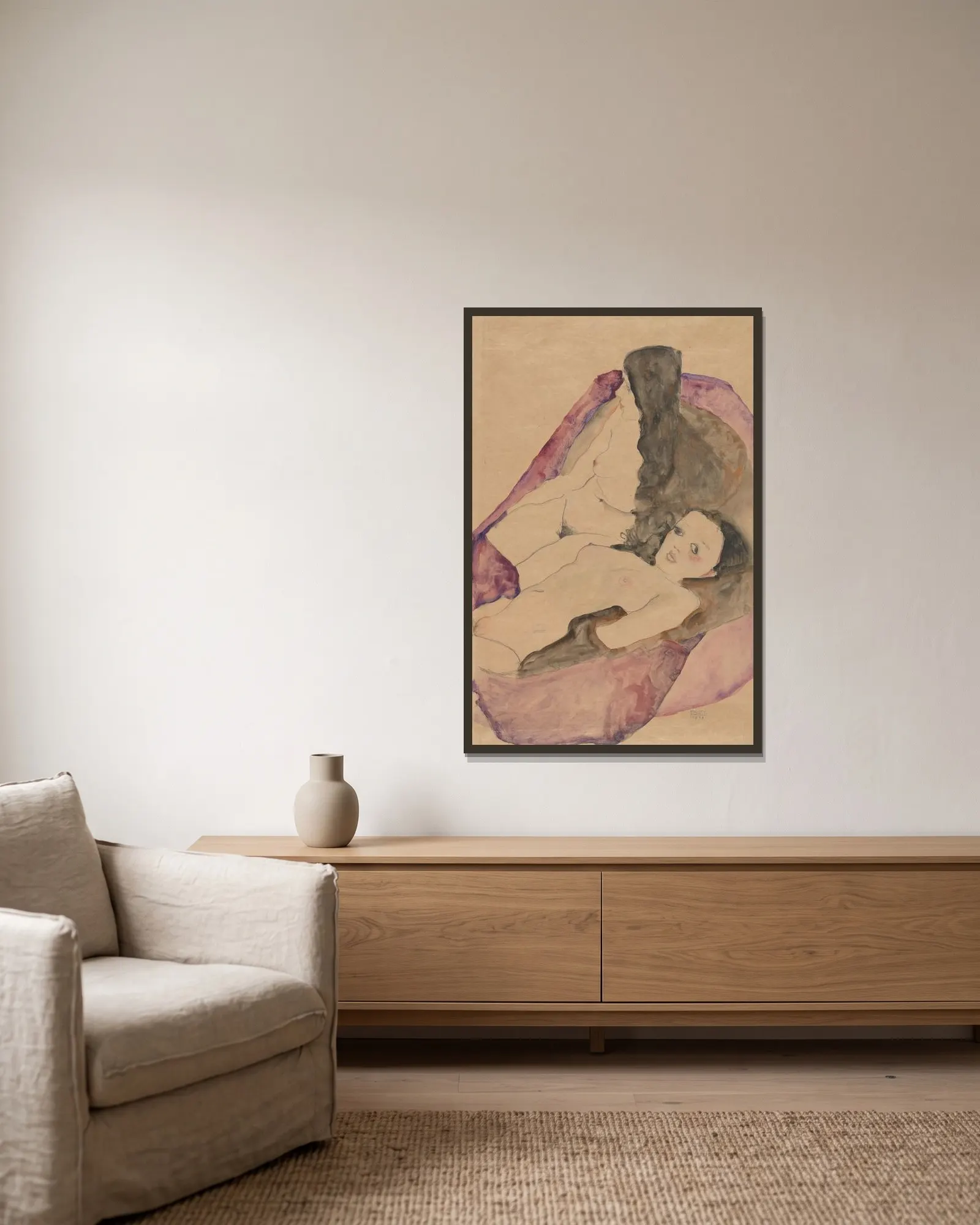 Two Reclining Nudes av Egon Schiele inramad på en vägg