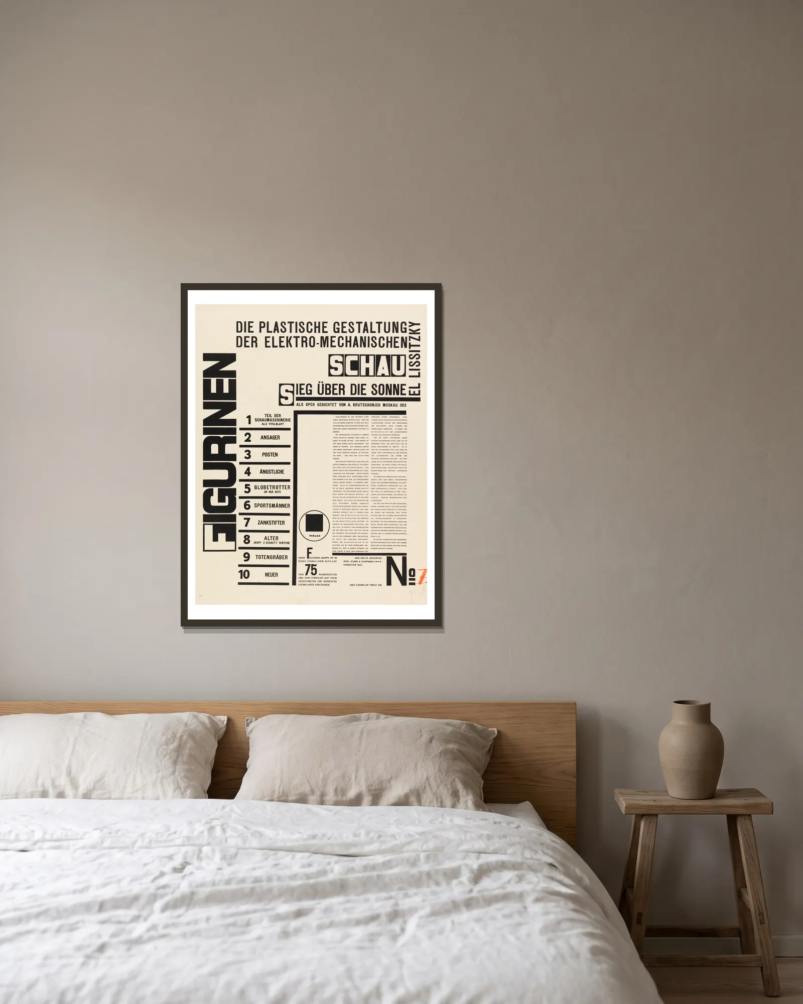 Figurines – title page av El Lissitzky inramad på en vägg