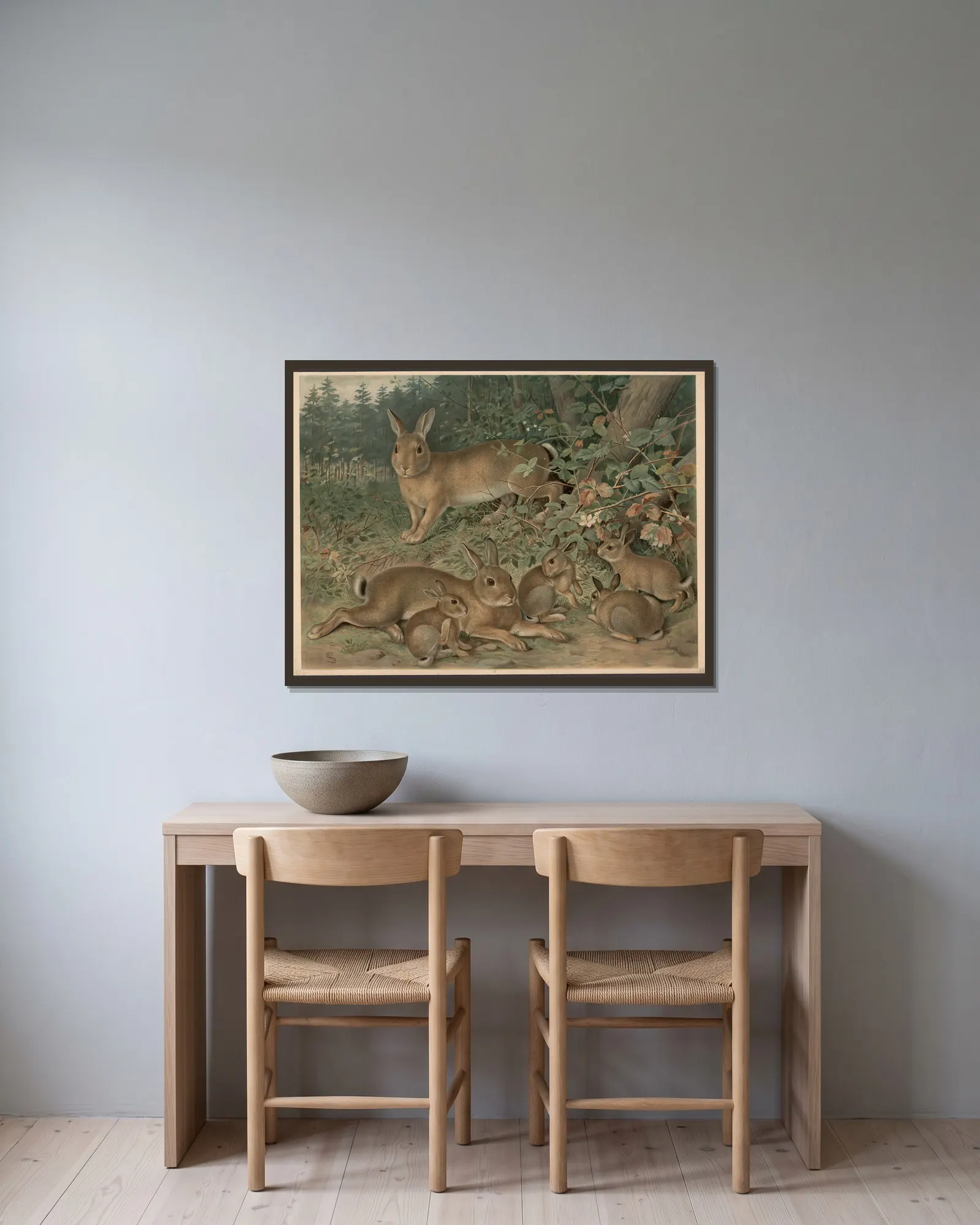 Rabbits av Emil Schmidt inramad på en vägg