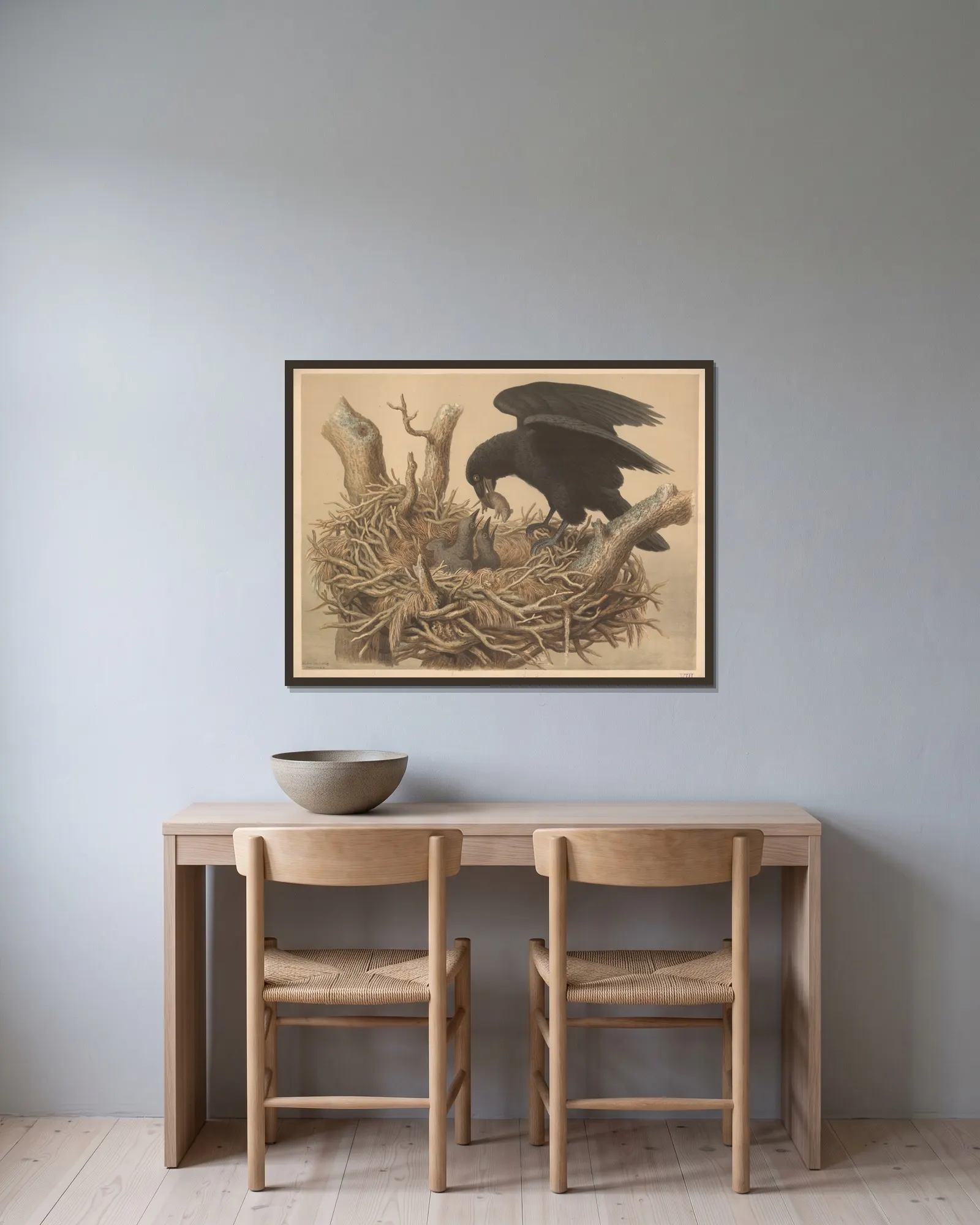 Raven av Emil Schmidt inramad på en vägg