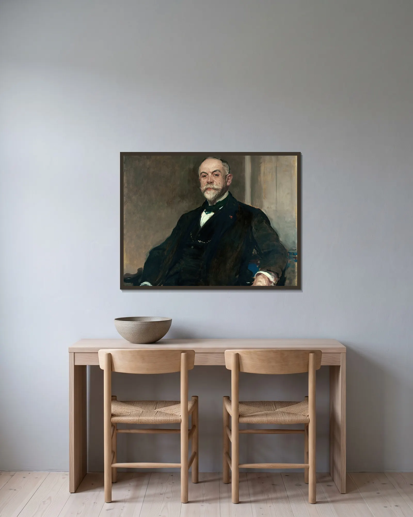 Portrait de Léon Pissard av Jacques-Émile Blanche inramad på en vägg