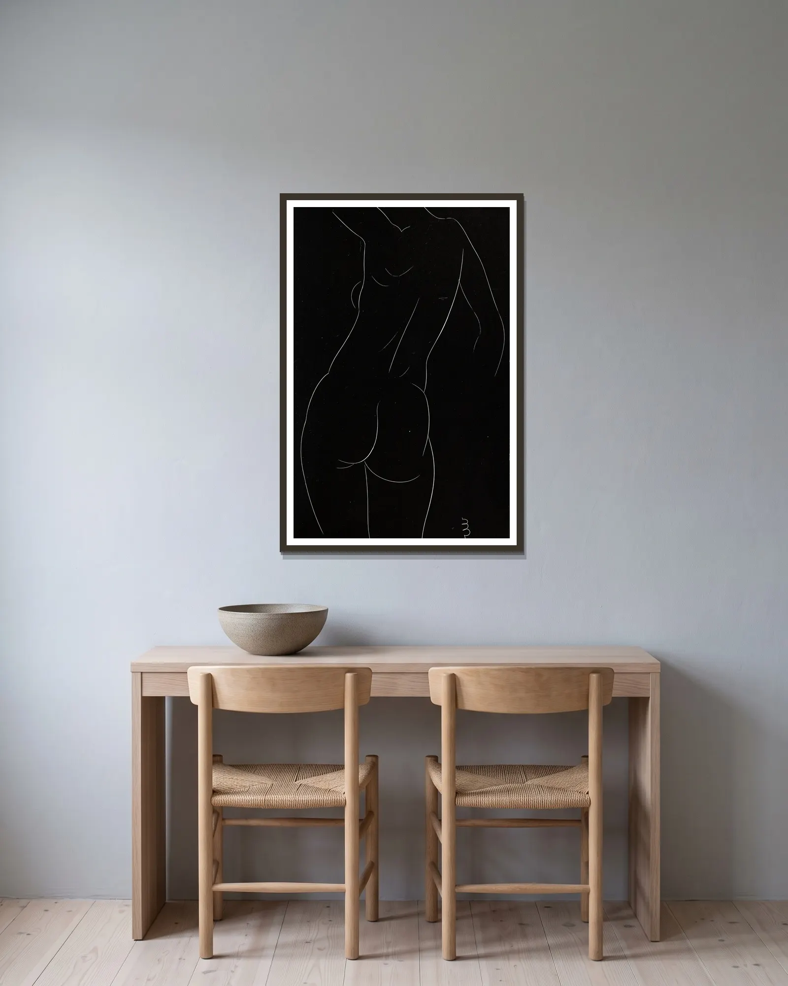 Twenty-five nudes Pl 09 av Eric Gill inramad på en vägg