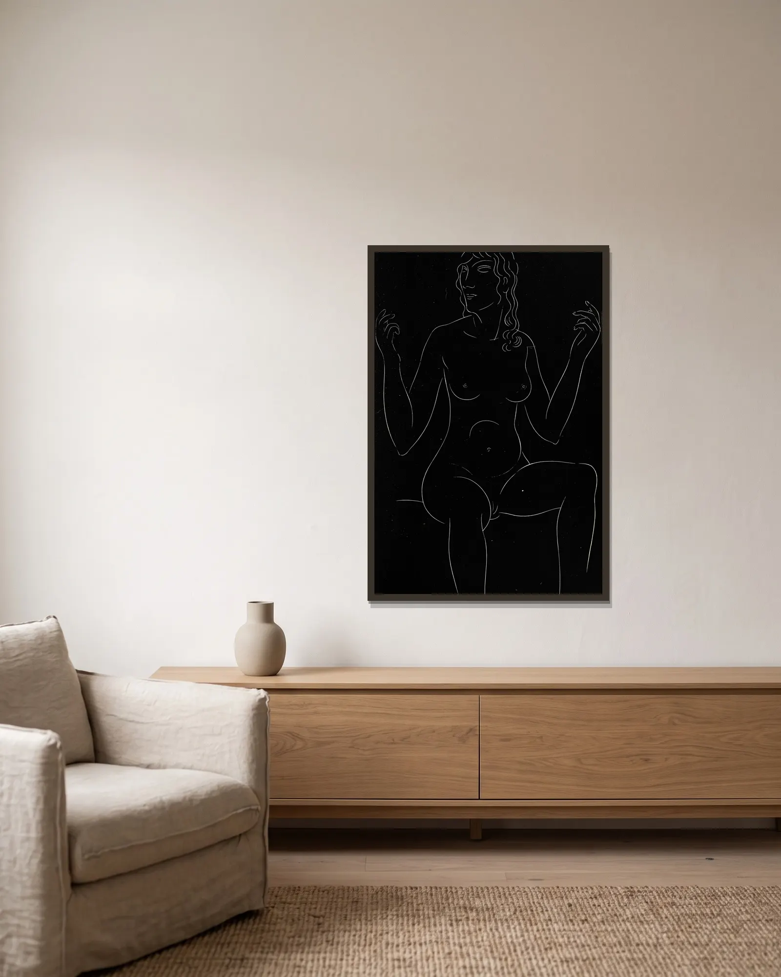 Twenty-five nudes Pl 12 av Eric Gill inramad på en vägg