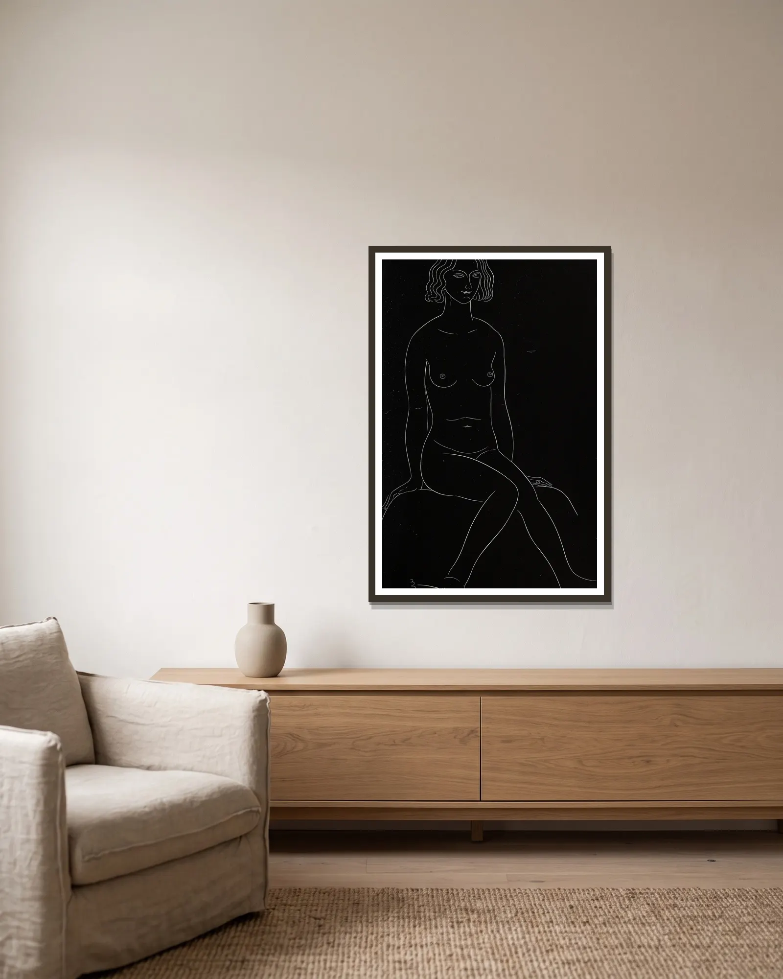 Twenty-five nudes Pl 19 av Eric Gill inramad på en vägg