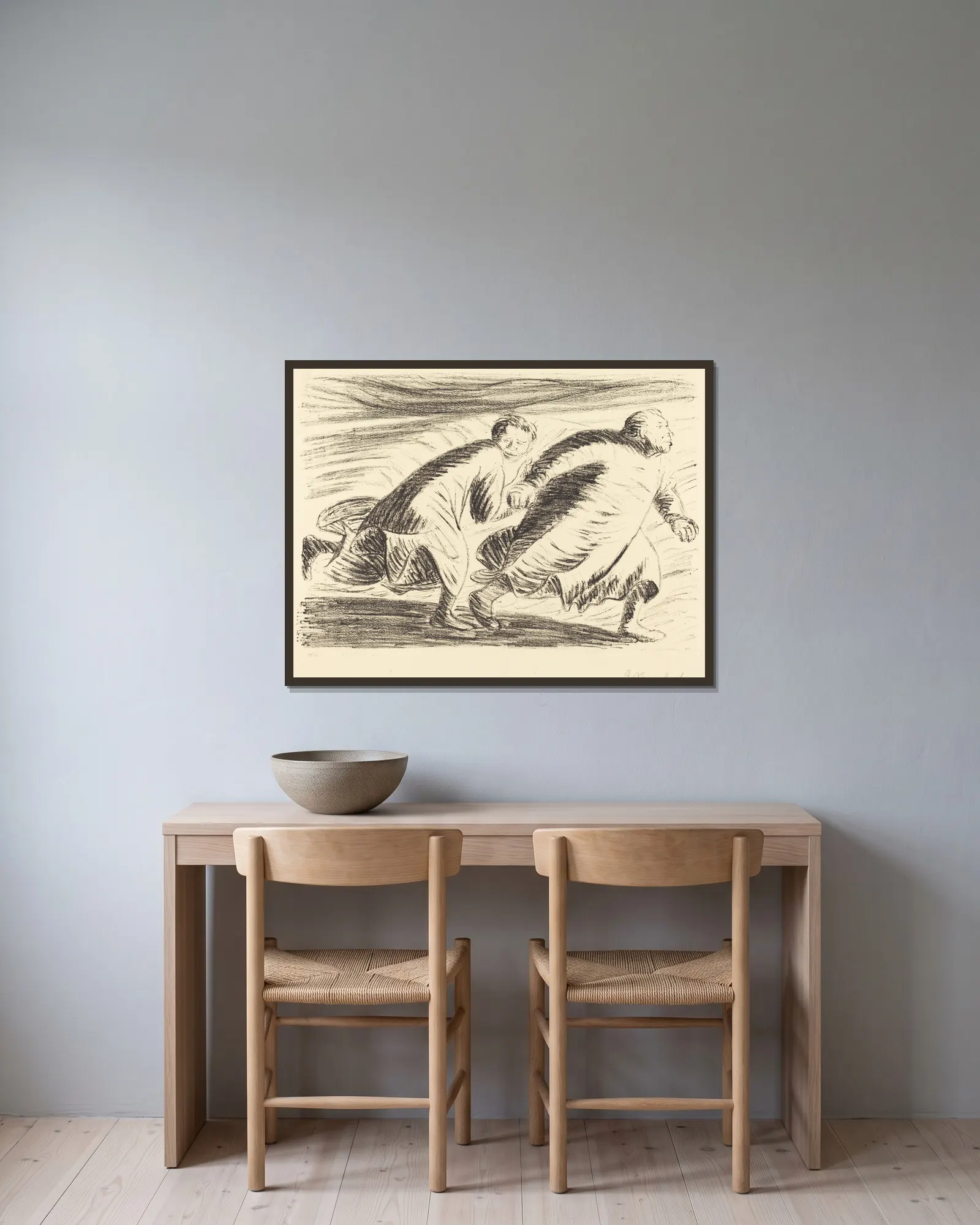 The Fugitives av Ernst Barlach inramad på en vägg